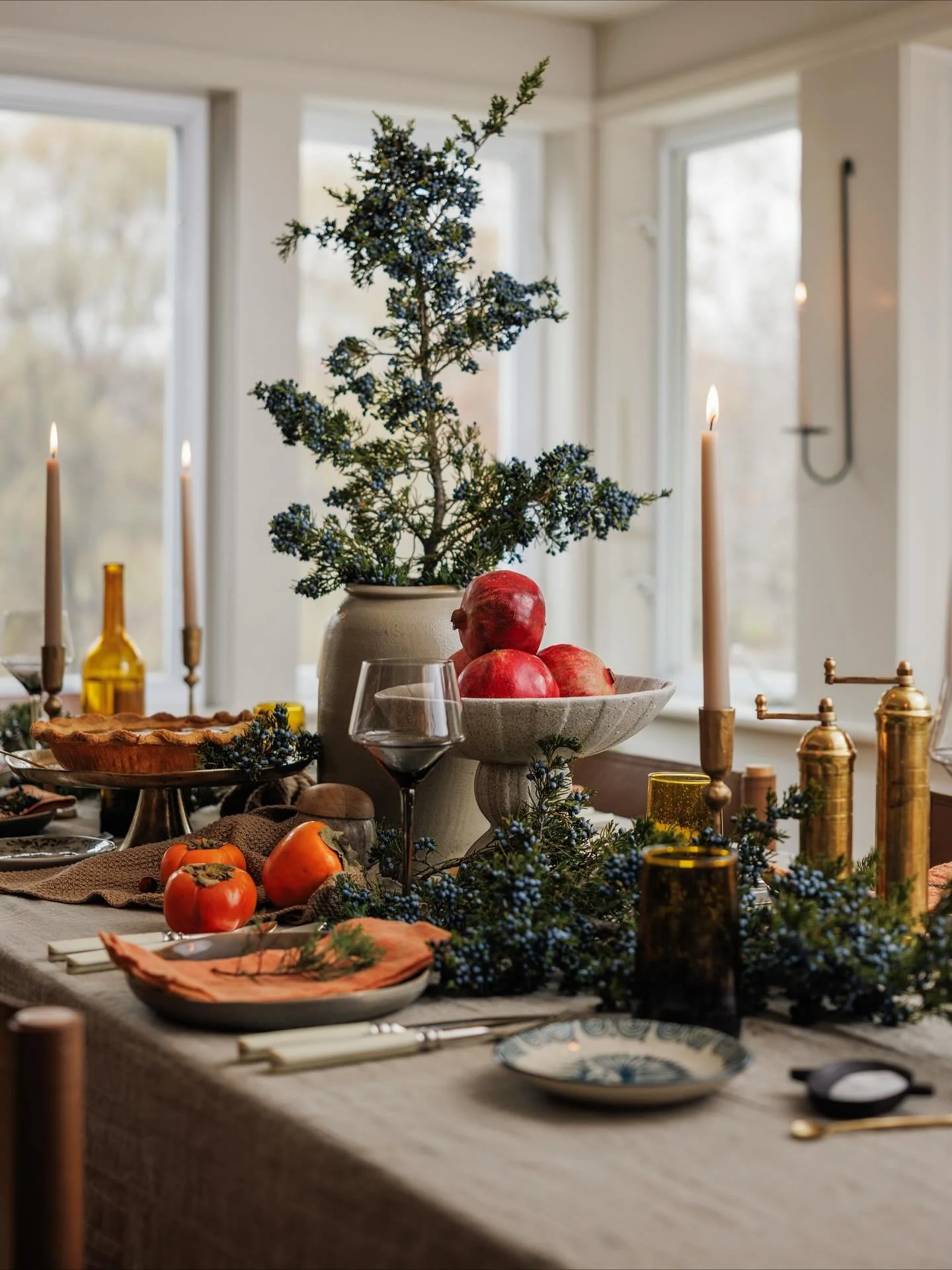We usually host 25&ndash;30 people, so extending the table to run the length of the house has become our signature move. There&rsquo;s nothing like seeing everyone gathered in one long ribbon of candlelight. 

We&rsquo;ll be doing the big table again