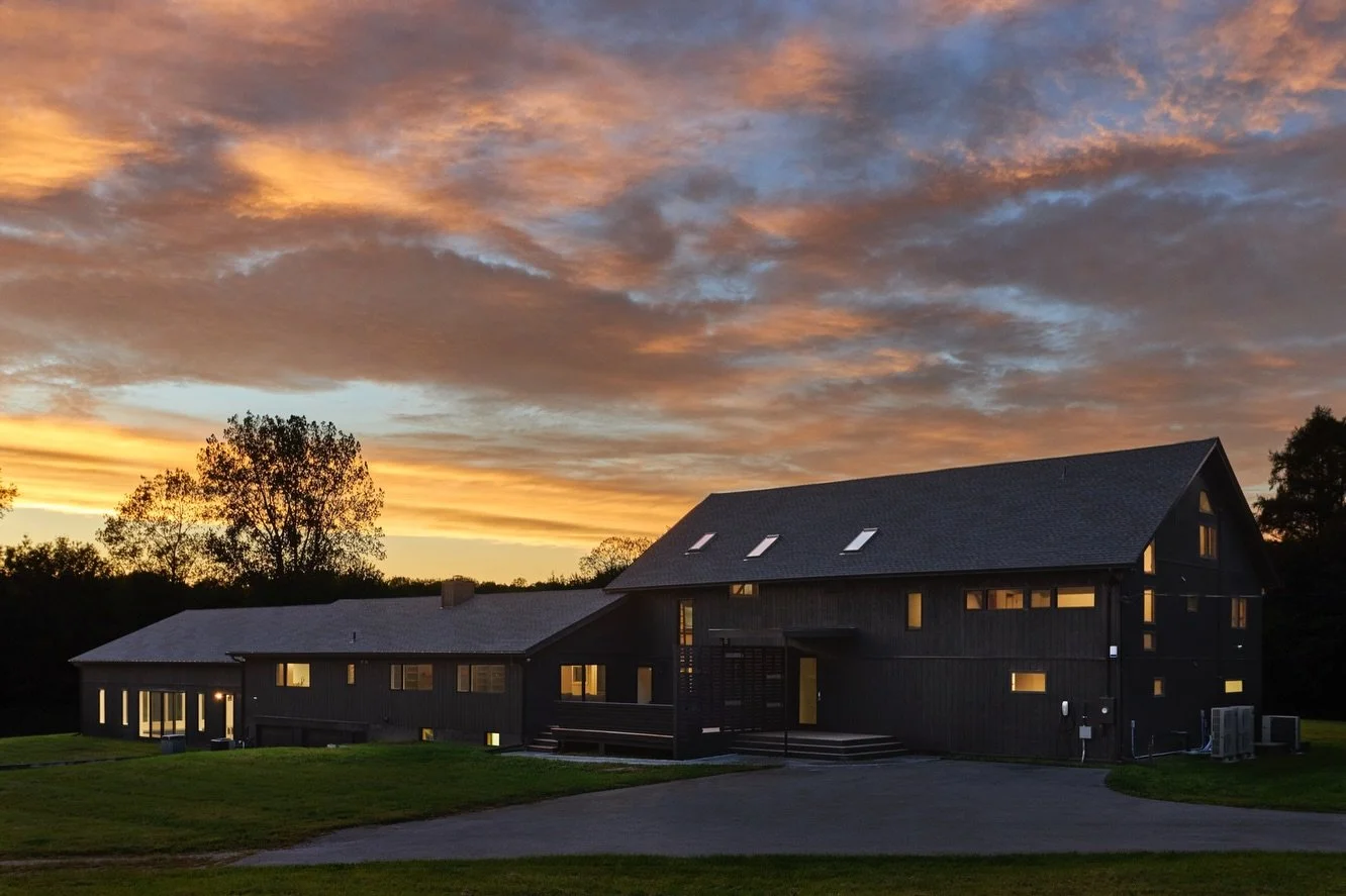 Cold Spring Creek House is a luxury Stanfordville vacation rental set on 13 private acres in the Hudson Valley. This meticulously restored barn features a year-round indoor pool, soaring 22-foot ceilings, and expansive living spaces designed for both