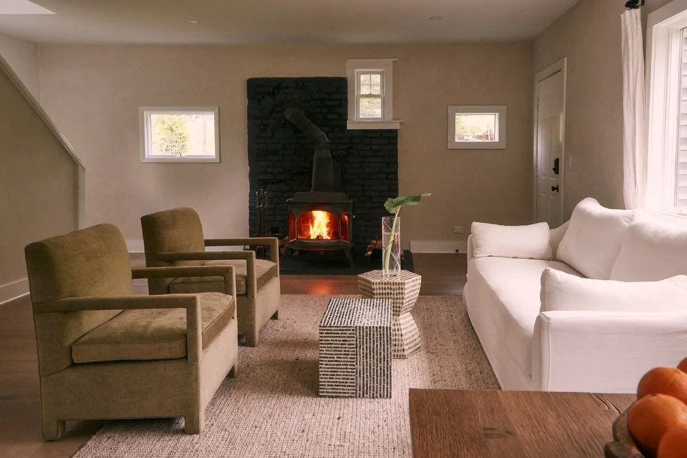 Modern country living in the Hudson Valley. This beautifully reimagined 1949 home sits on 2 private acres near Hudson, Red Hook, and Pine Plains, offering an open-concept layout, abundant natural light, a first-floor primary suite, and seamless indoo
