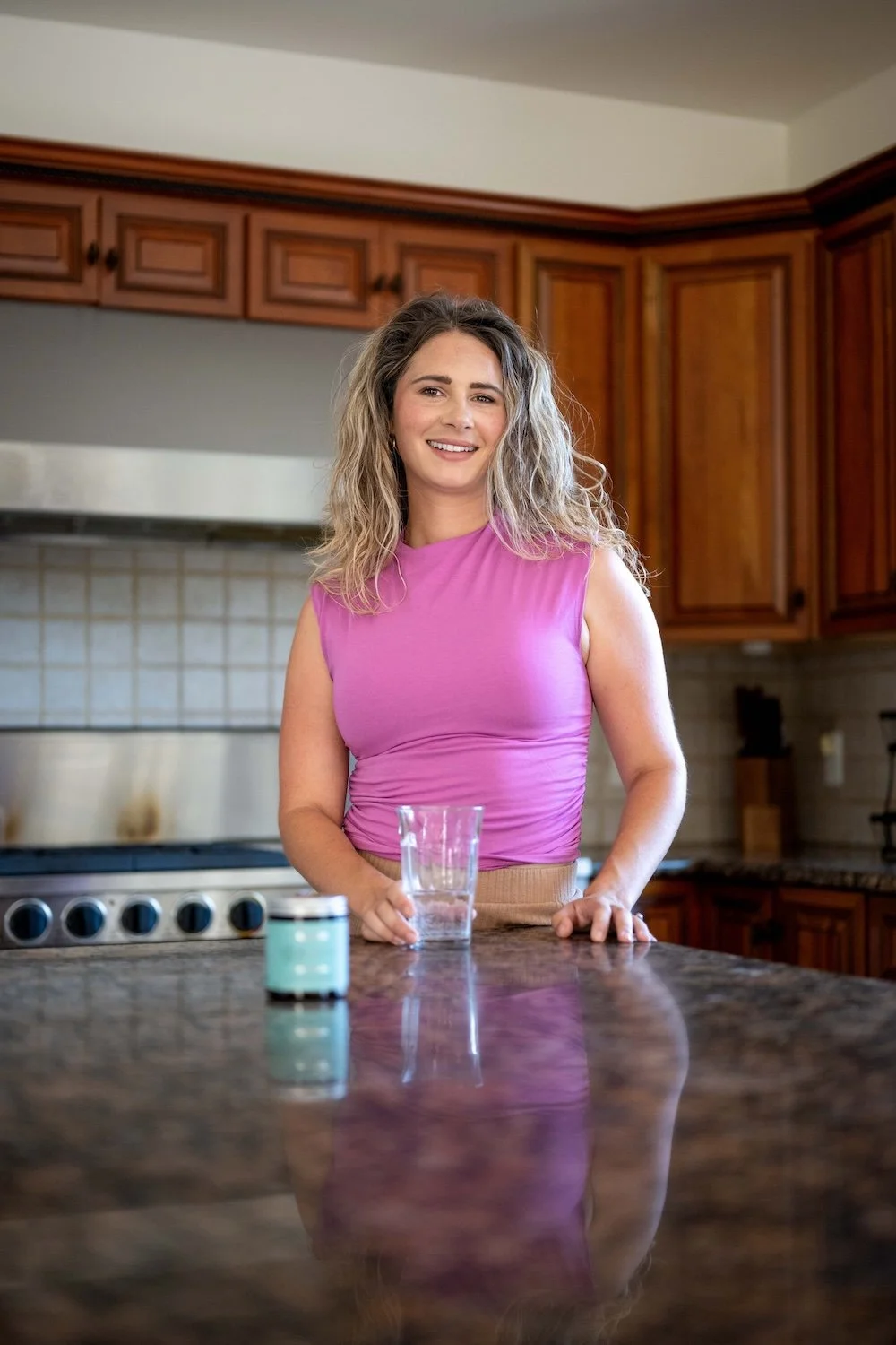 leah brueggemann standing in kitchen