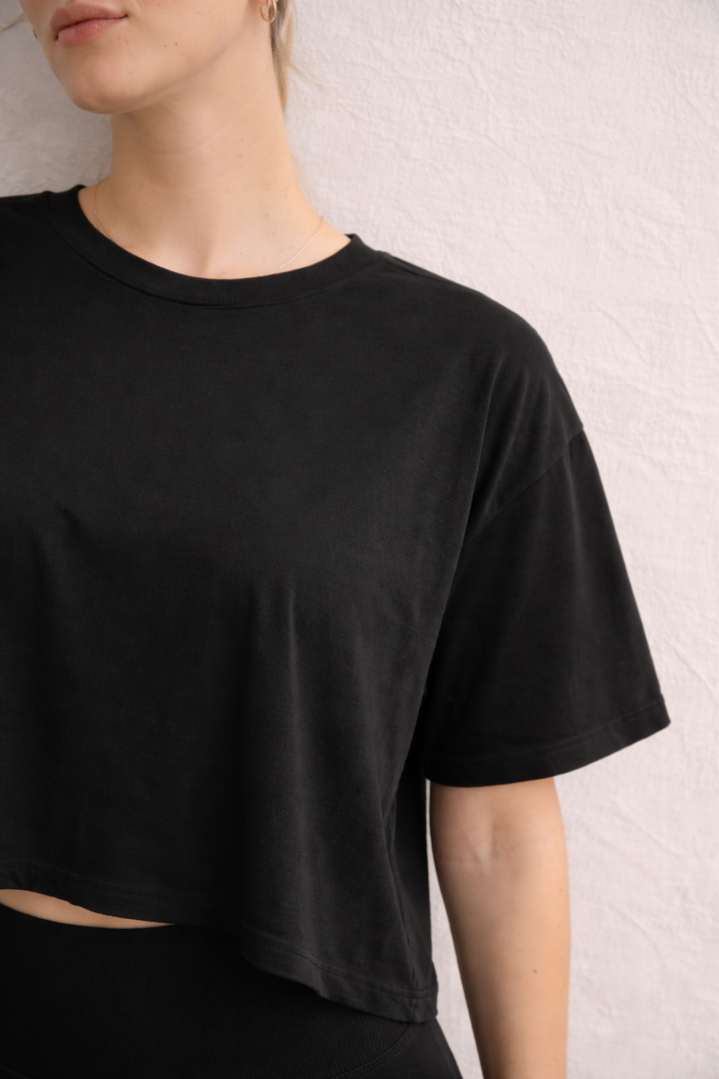atiya-london-black-tshirt-model-detail.png