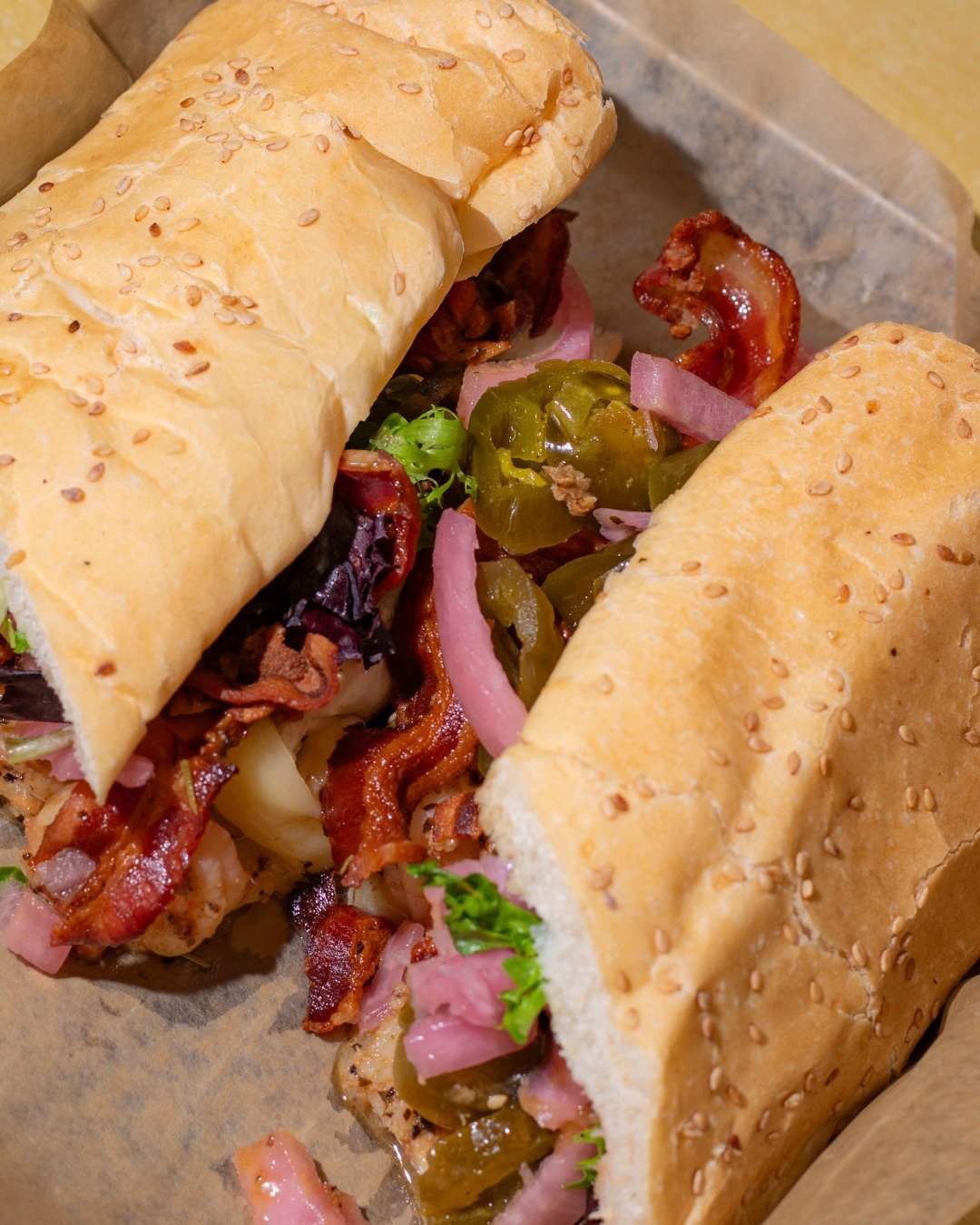 The Diablo Po&rsquo;Boy is not here to play 🔥

Loaded with shrimp, crispy bacon, jalape&ntilde;os, and pickled onions for the perfect mix of heat, crunch, and flavor.

New Orleans, Seafood, Cajun Food