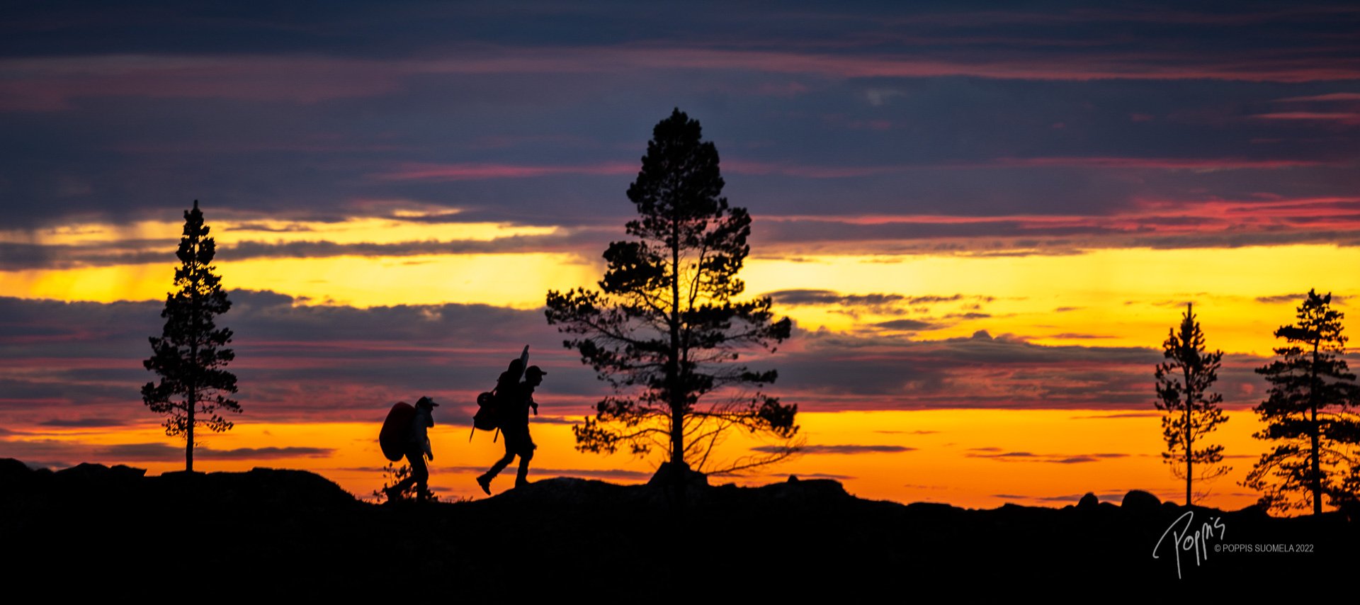 Team Sevetti Hillclimb hiking to the sunset