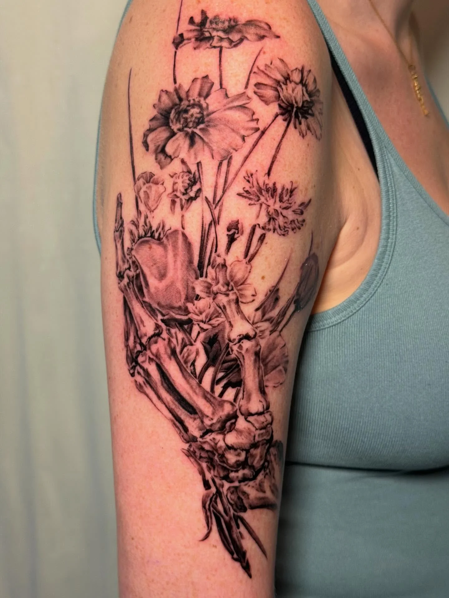 Bringing your passions and career to art. Thank you for trusting me with this anatomical skeleton hand.
.
Booking for Large Scale work. 
.
#BlackAndGreyTattoo #SanDiegoTattooArtist #RealismTattoo #SkeletonTattoo #FloralTattoo