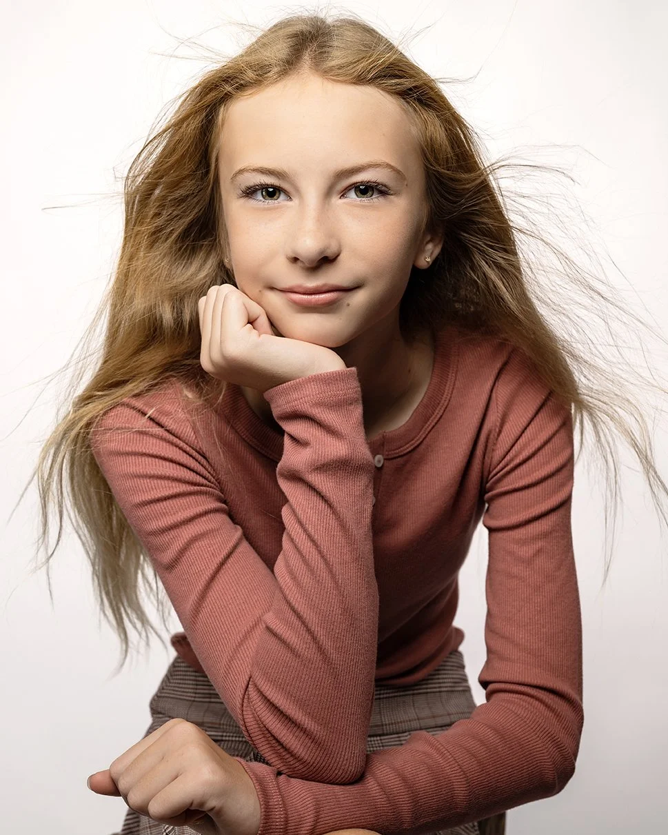 young girl with studio lighting headshot