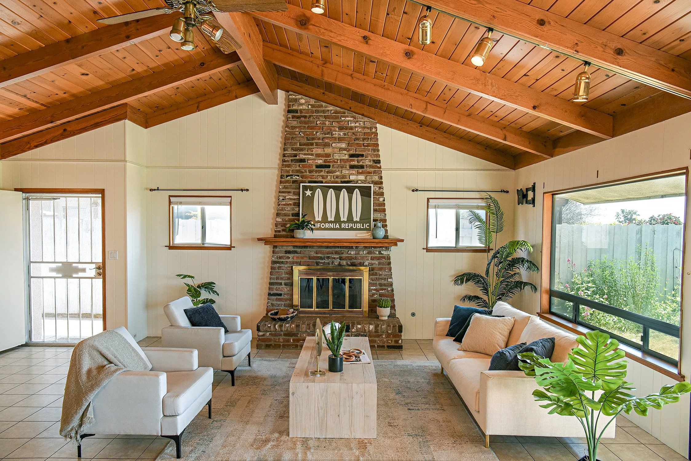 A beautiful fireplace in living room with a beach view, Ventura