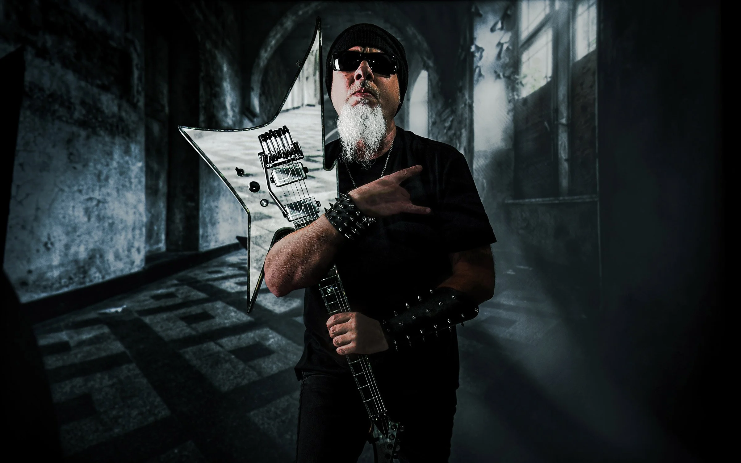 Heavy metal guitarist posed with his instrument, Oxnard