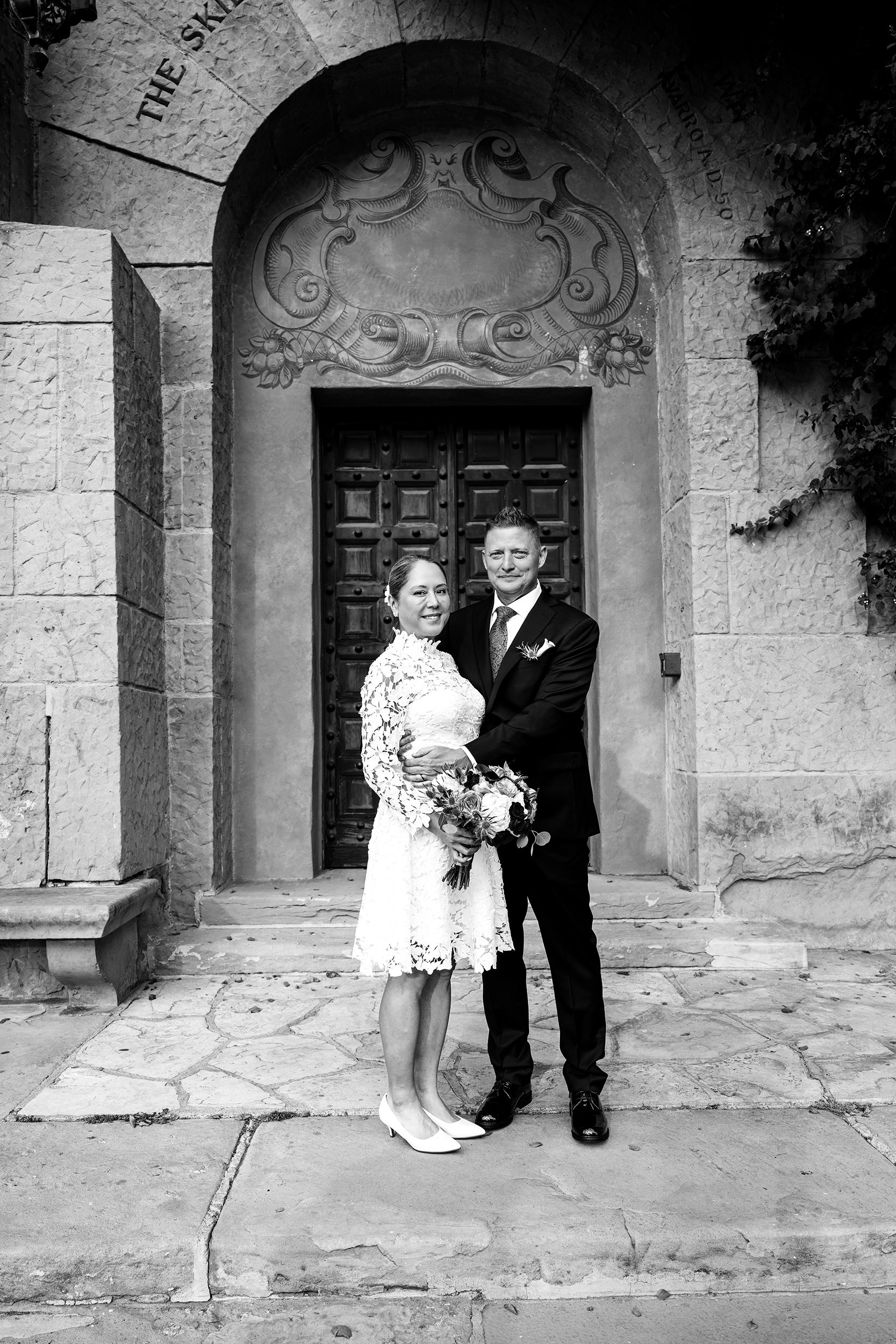 black and white wedding photography of  couple at court house