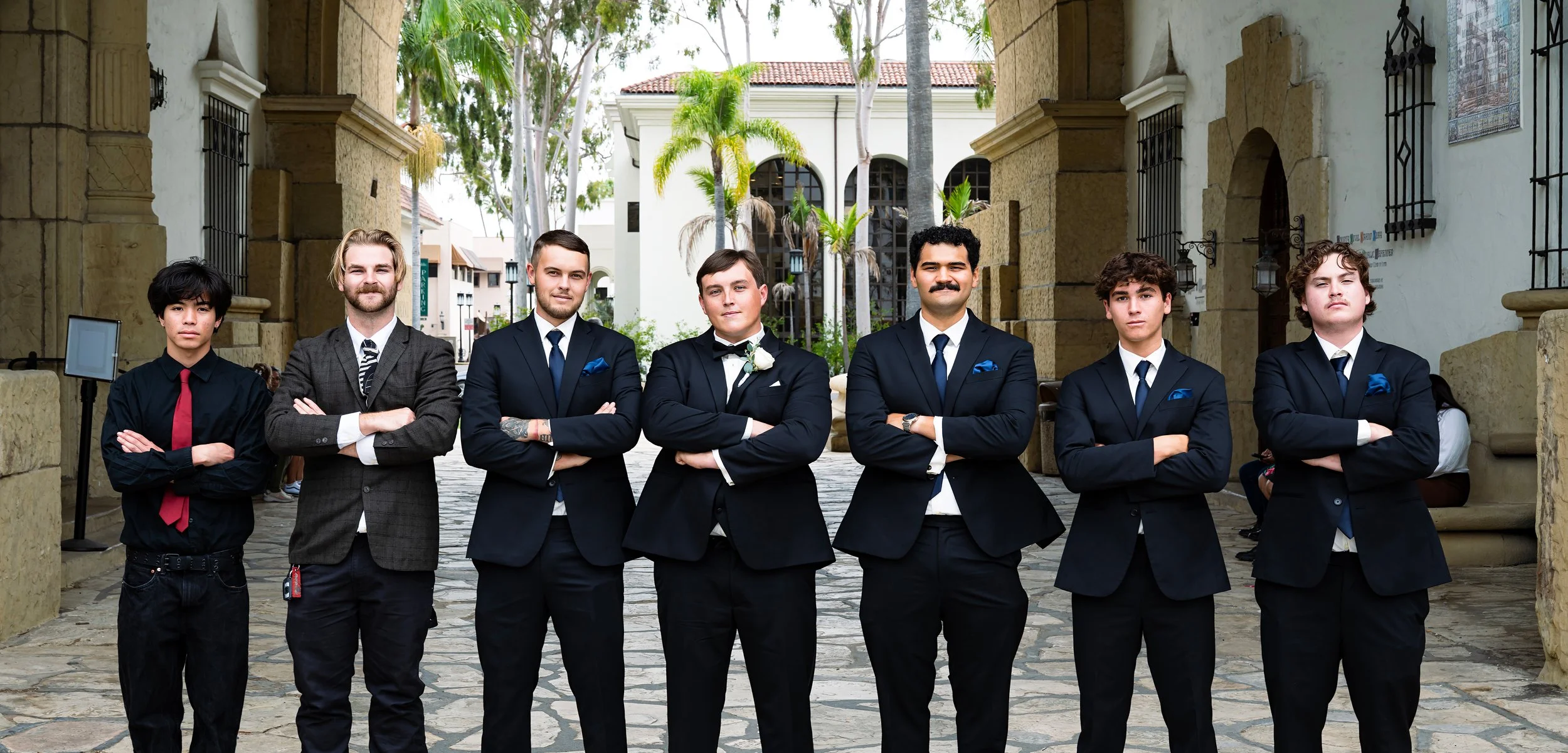 The groomsmen line up for a portrait