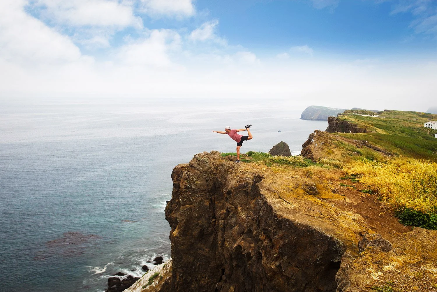 Lifestyle editorial shot of hikers reaching scenic island view
