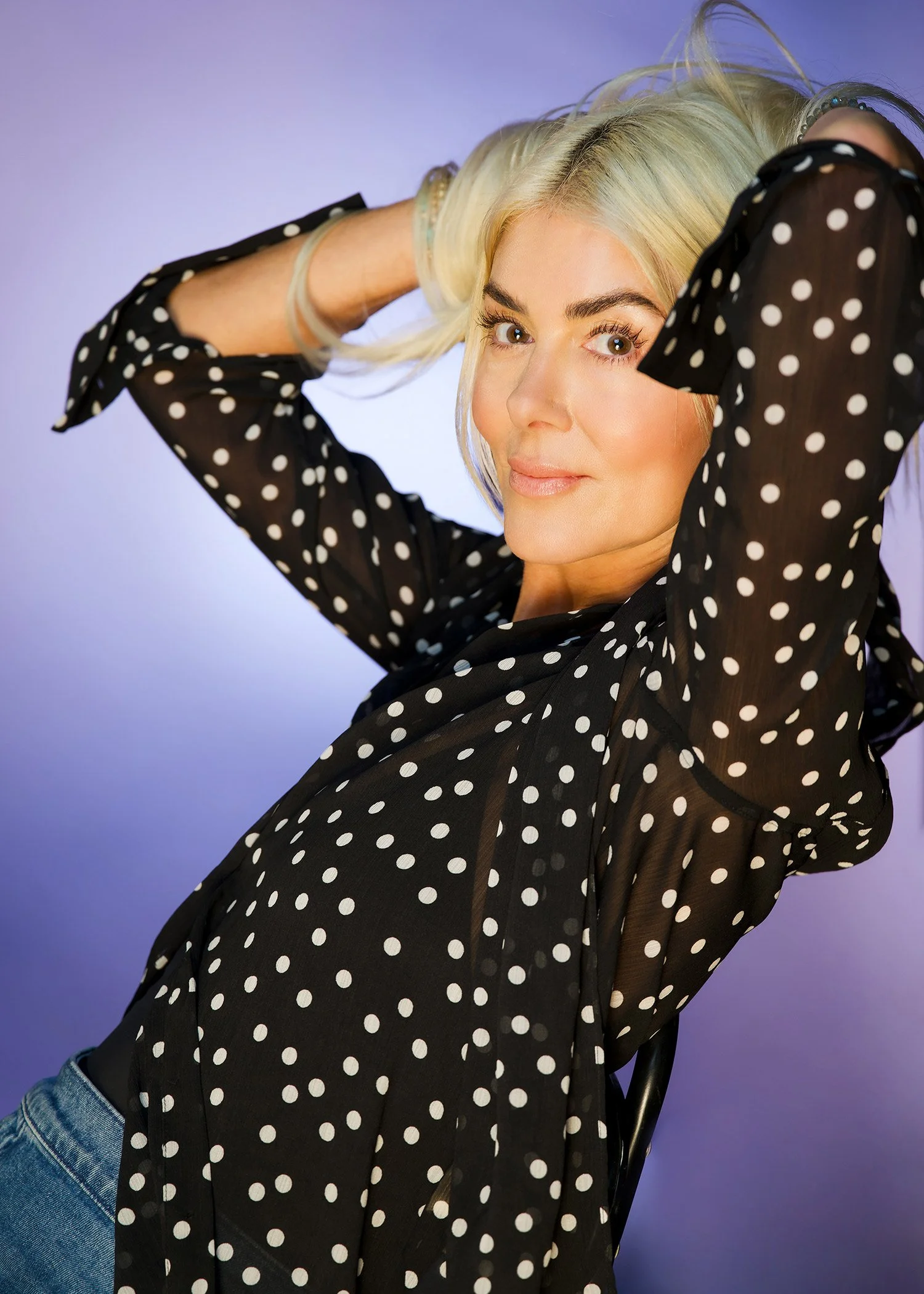 Studio headshot of middle aged actress