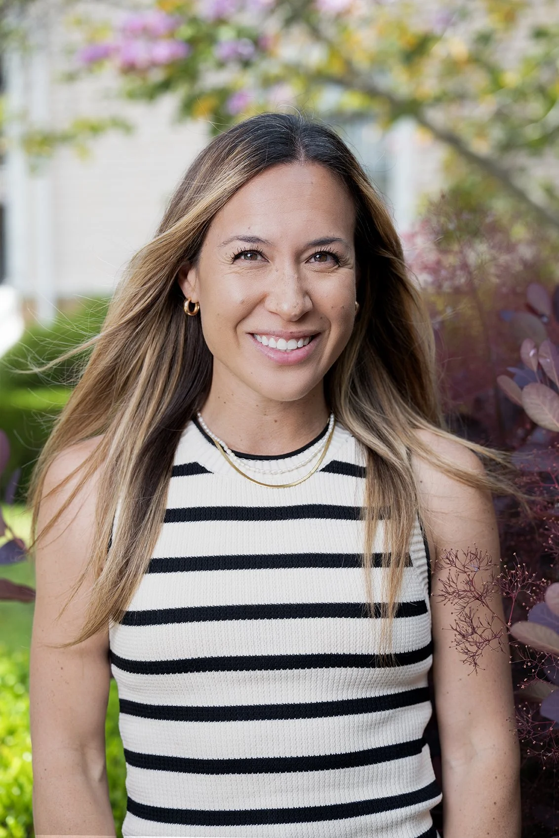 Headshot of young woman for professional networking use.