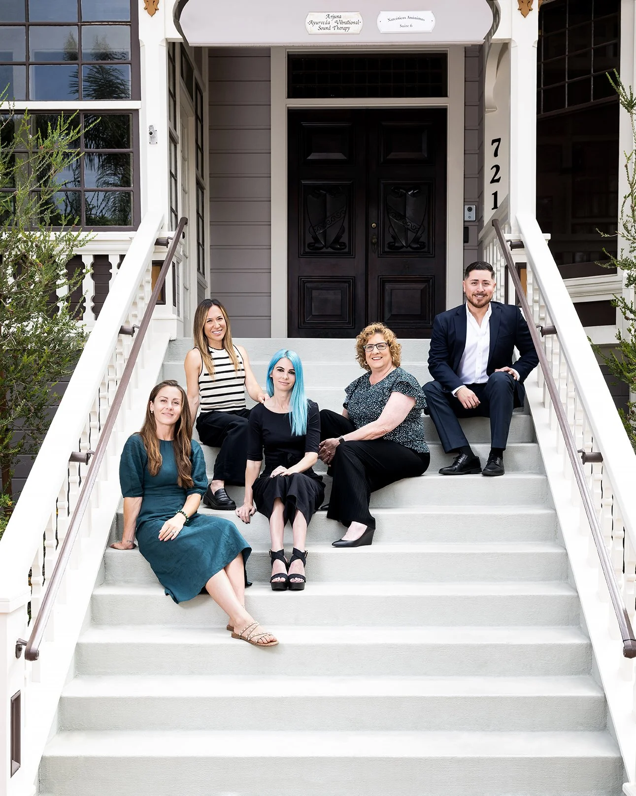 Team Visit Oxnard on the steps at Heritage Square in Oxnard