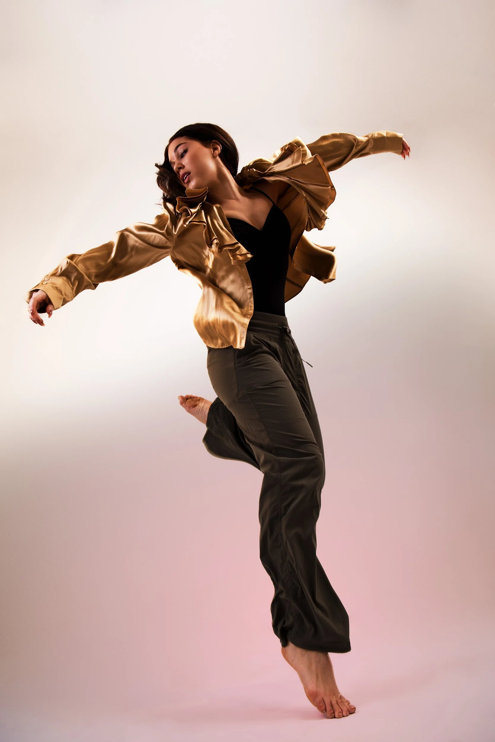 Golden shimmer and creative studio lighting for fashion shoot