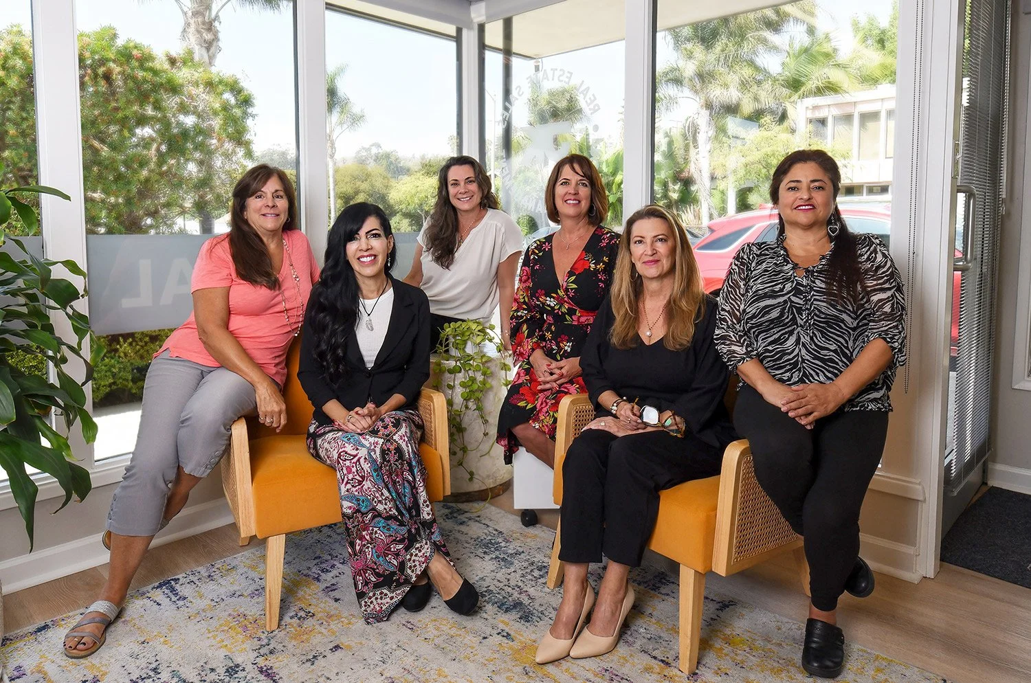 Female team real estate group portrait for advertisement