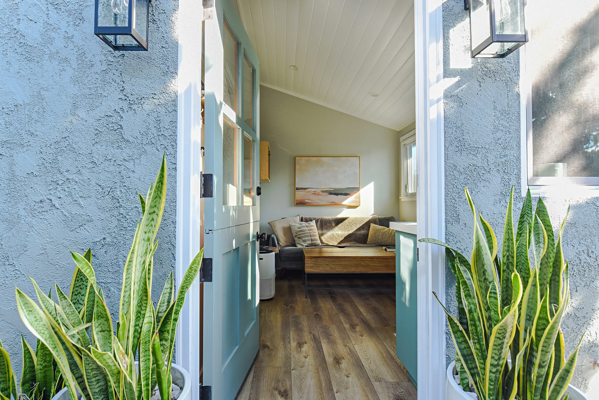 an open door to a cozy living space invites the viewer in