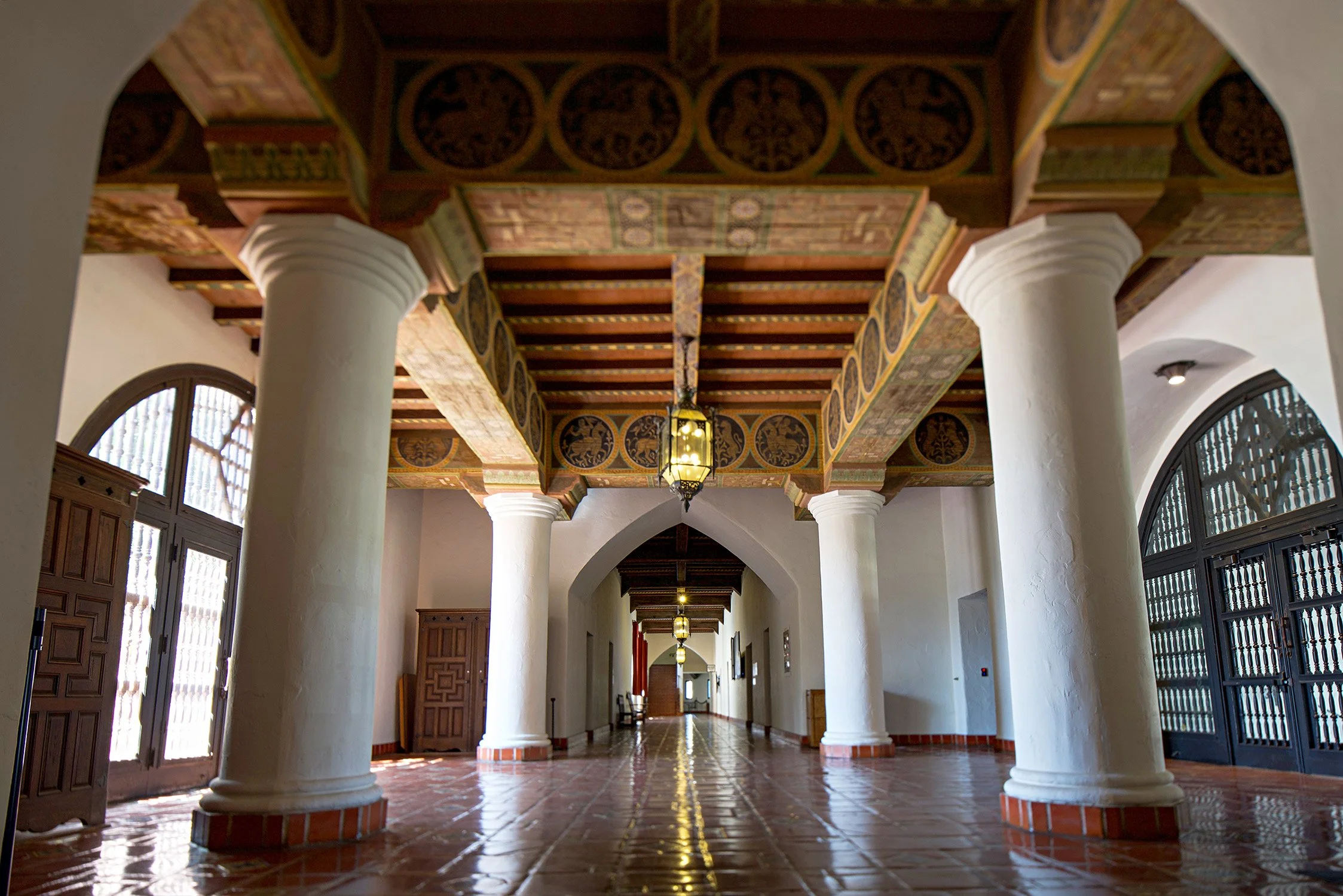 Reflections of the beautiful wood work in the Santa Barbara courthouse on the tiled floors