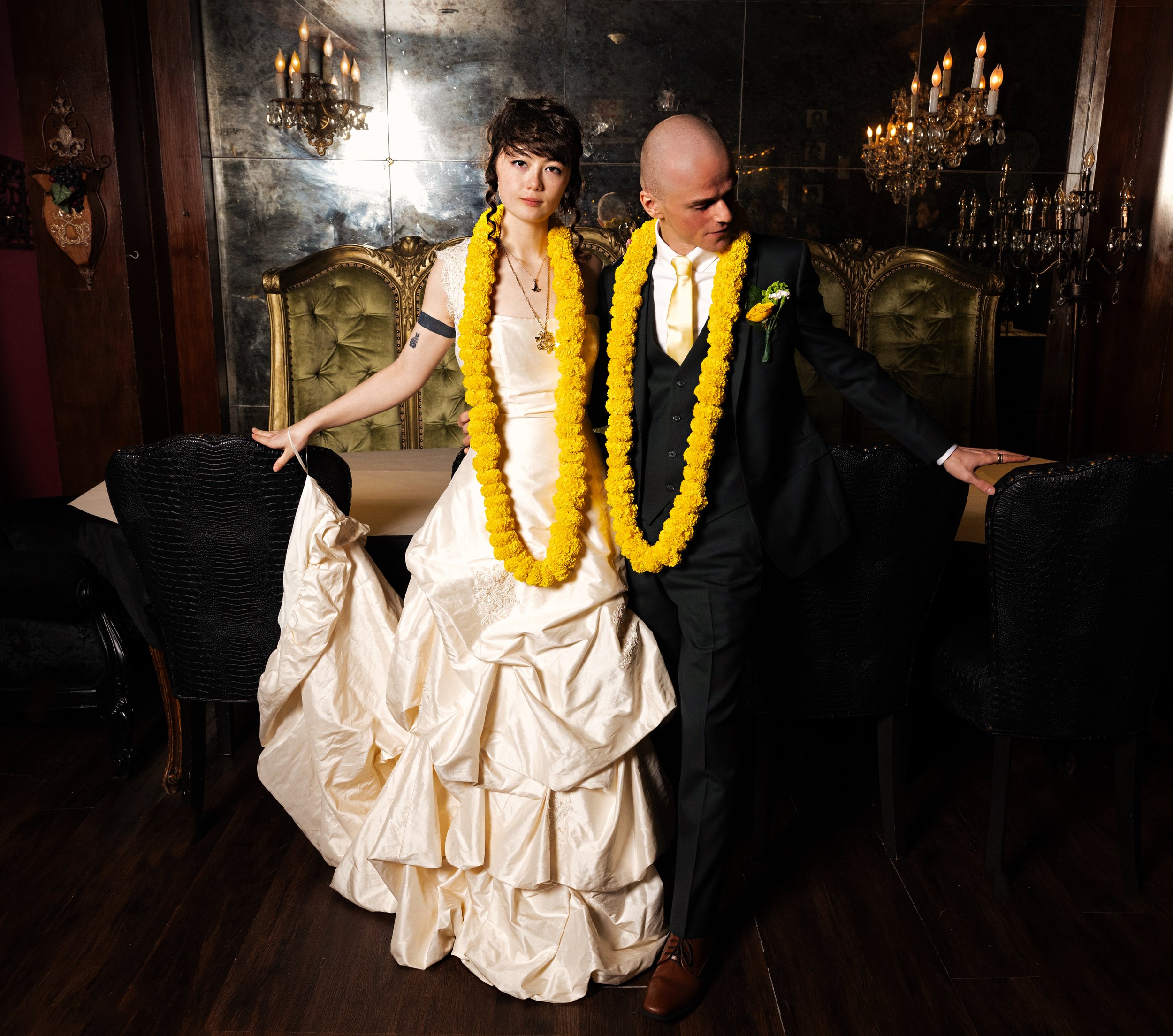 Newly married couple portrait in low light setting