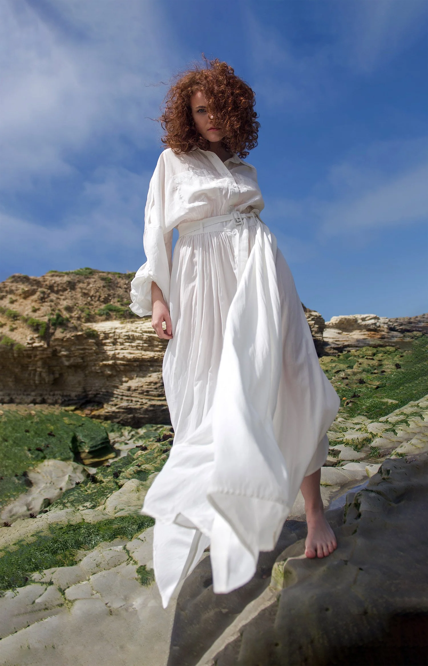 portrait of model in white dress in nature