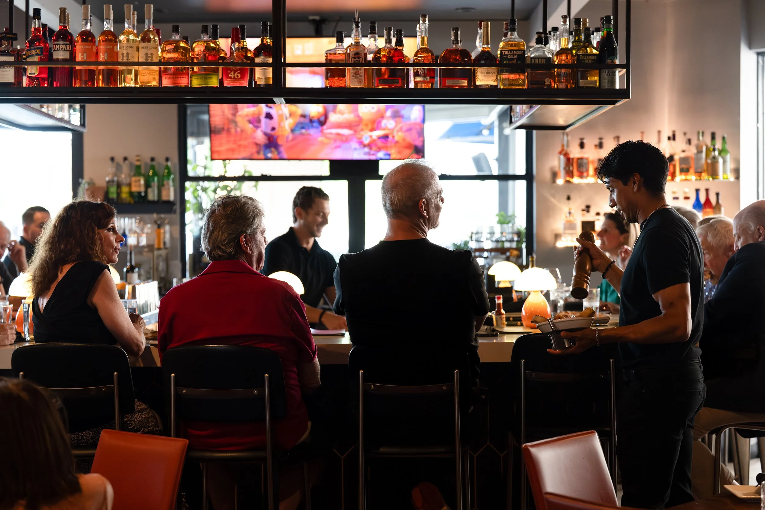 Lively bar scene at PUbblicos Italian Eatery of Scottsdale,