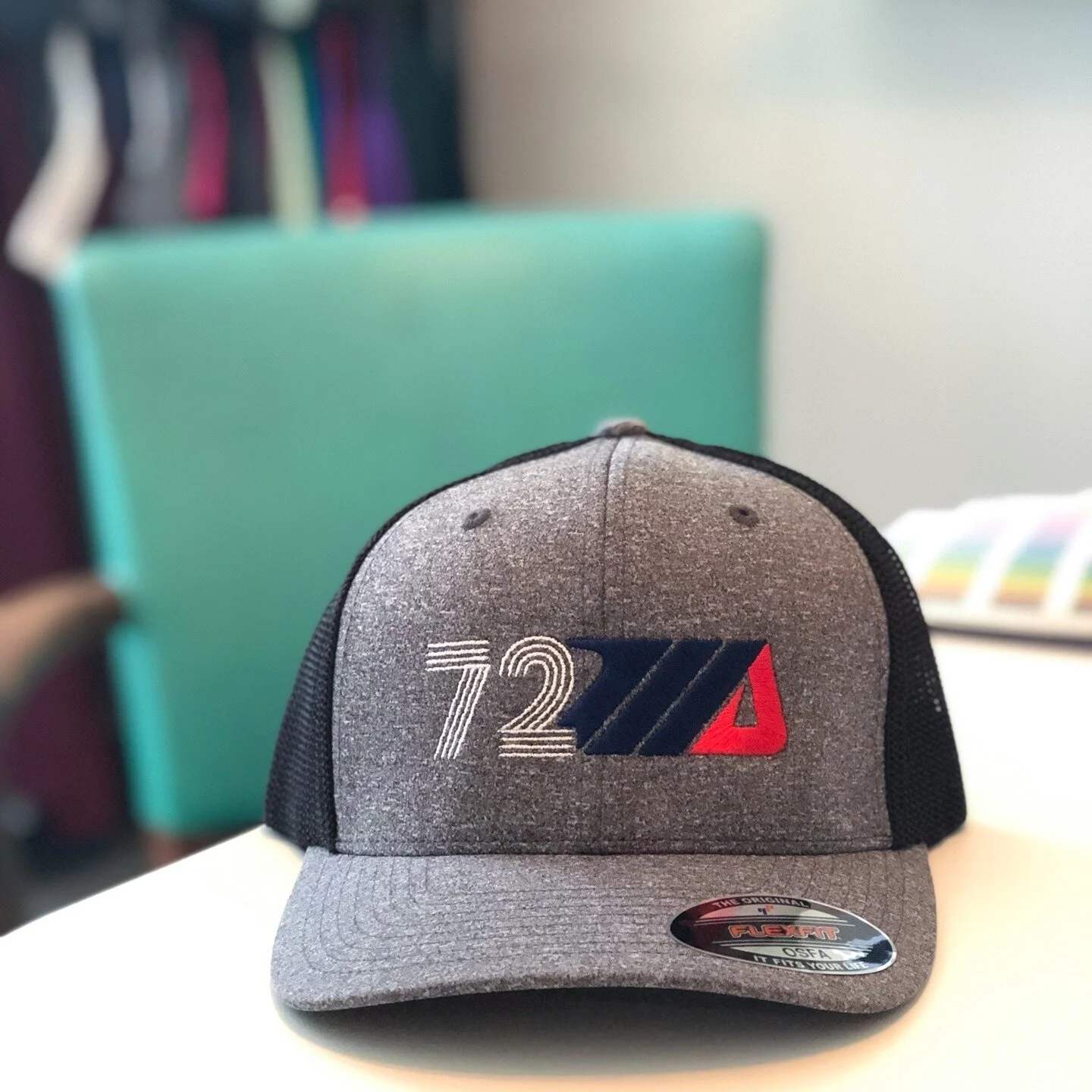 🏍️ Custom embroidered hats in heather gray! Check out our website for more options.