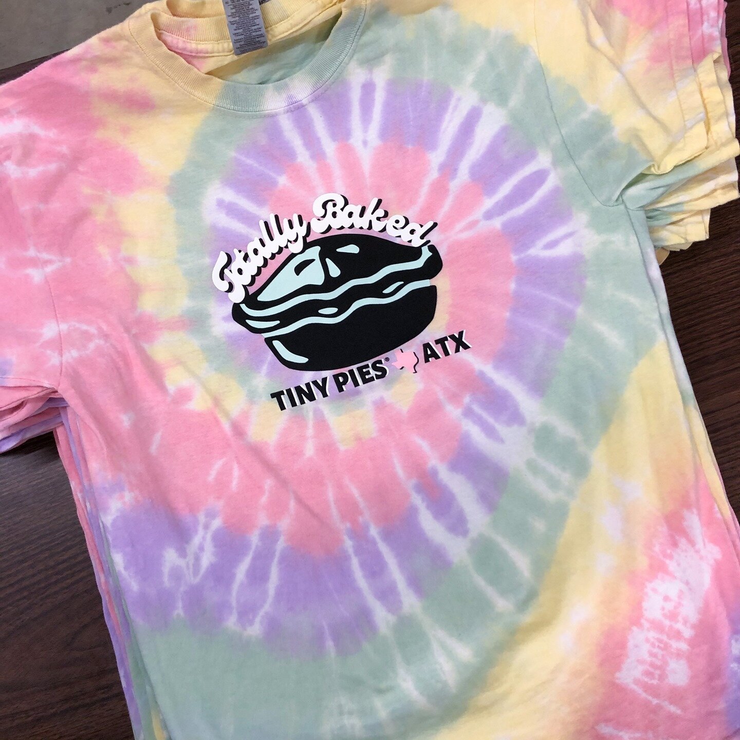 Tie dye Tuesday 😄  We love this design and t-shirt combo, SO good! 

New merch available in store at Tiny Pies 💕