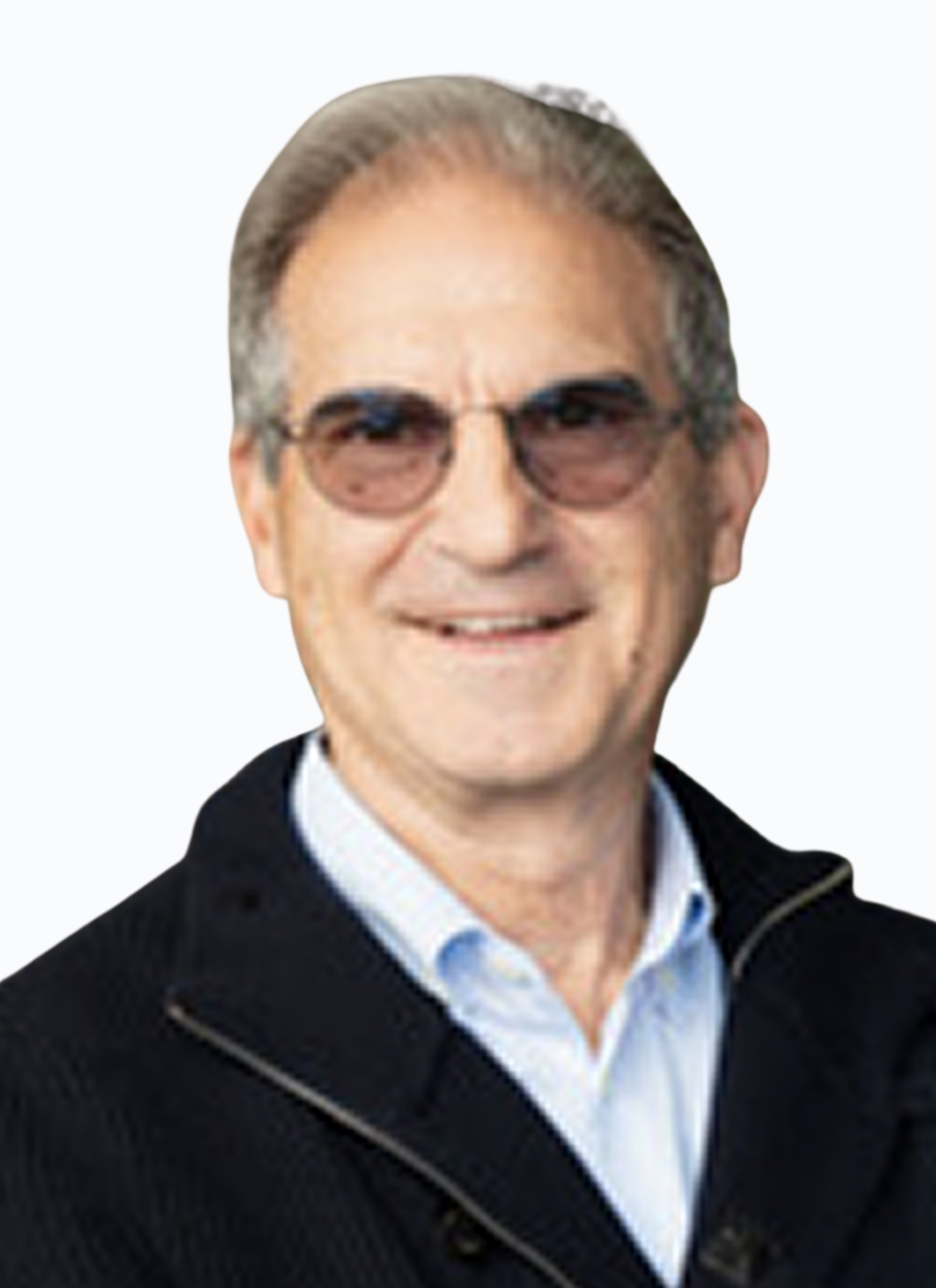 Smiling man wearing glasses, white shirt, and black jacket with a zipper.