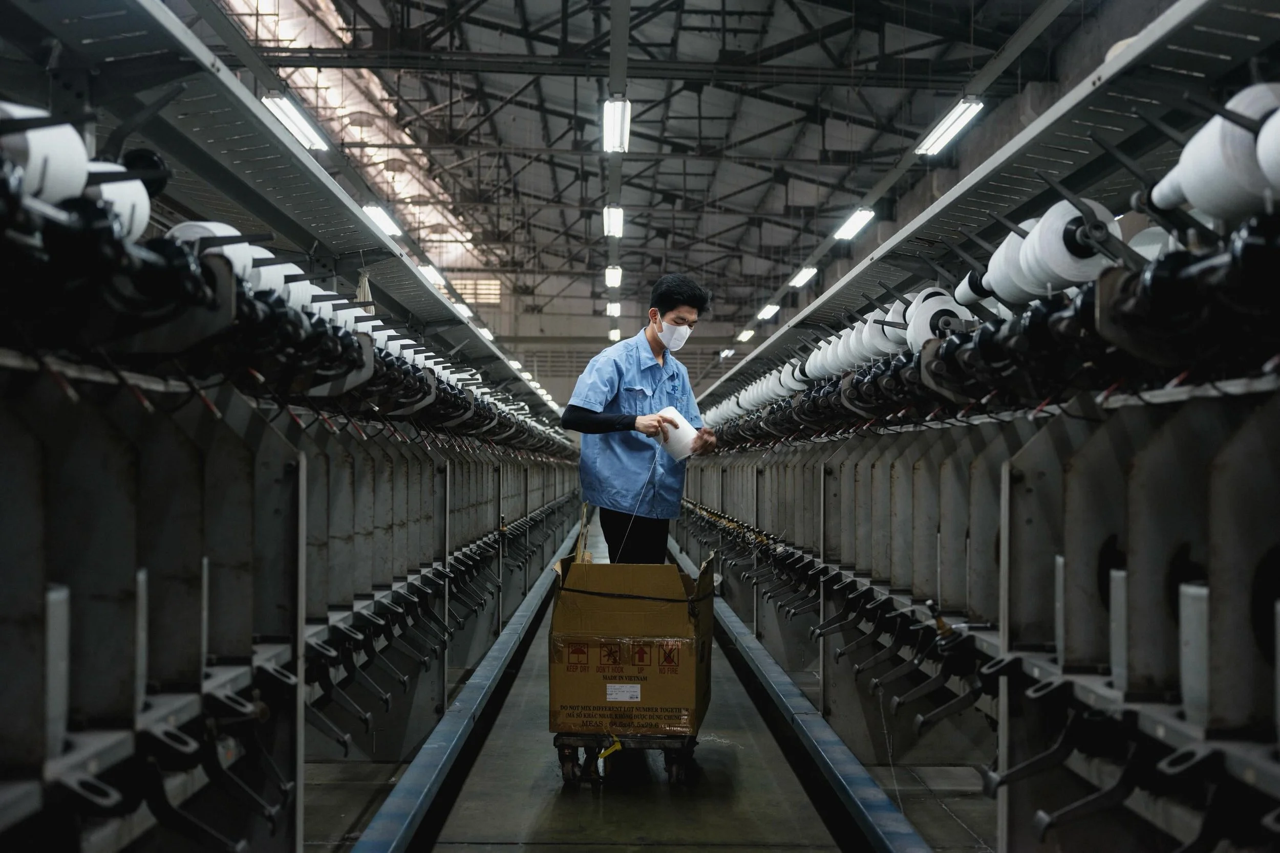 [FACTORIES] A refreshing change from the streets of Saigon to clothing and footwear factories. A different world, but looking for the same thing: real moments.
