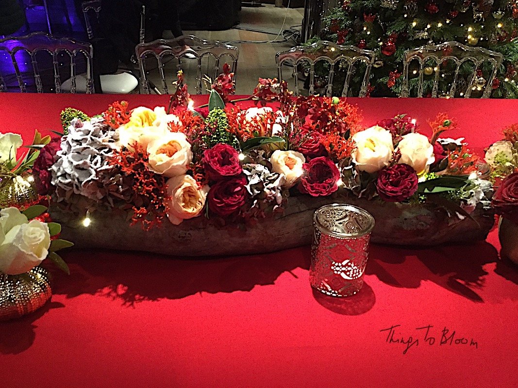 Composition florale de Noel tons rouges .jpg