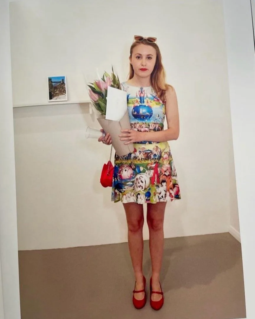 The great artist @martinparrstudio took this photo of me, on the night of my degree show. In my Hieronymous Bosch dress, with flowers my aunt gave me, in my favourite red shoes, with my artwork behind me. I think it&rsquo;s the most me I&rsquo;ve eve