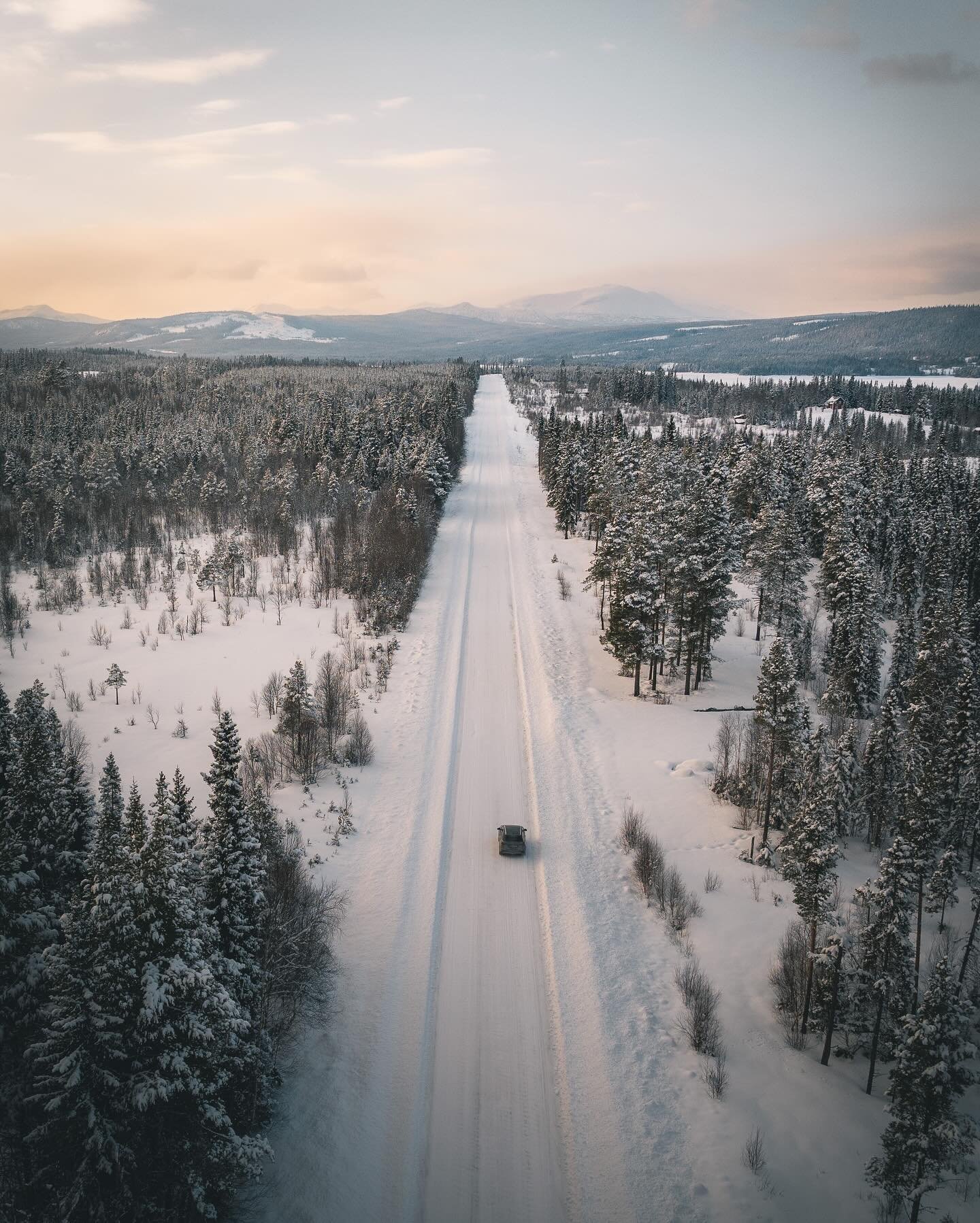 Driving through the beautiful light of Swedish Lapland at day&rsquo;s end. 
.
.
.
#landscape_captures #dronephotography #djiglobal_official #swedishlapland #lapland #winterwonderland #exploretocreate