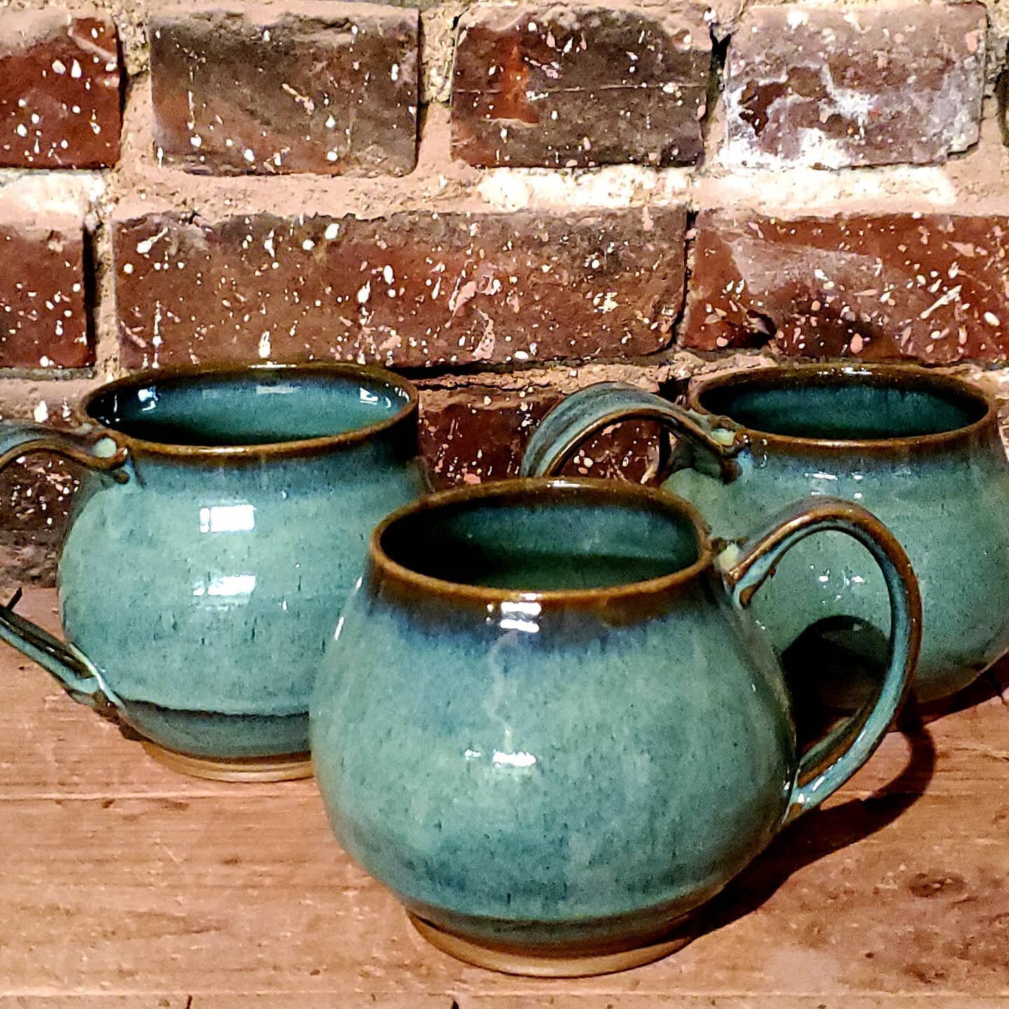 Hand made traditional ceramic butter bell pottery with blue finish and leaf  pattern Stock Photo - Alamy