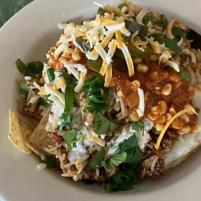 Hidden under this pile of goodness is chili beef, sunny eggs, rice, tortilla chips, jalapenos, cheddar, sour cream, salsa etc. Featured this weekend until it sells out! #rundontwalk # itwillsellout #2stardinertexmex