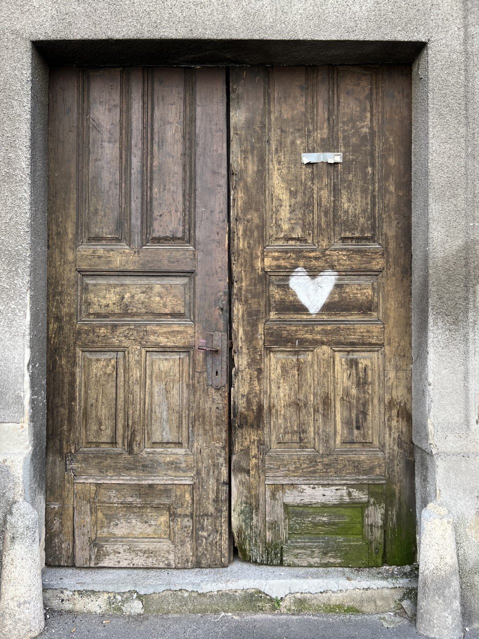 wooden door with a white heart