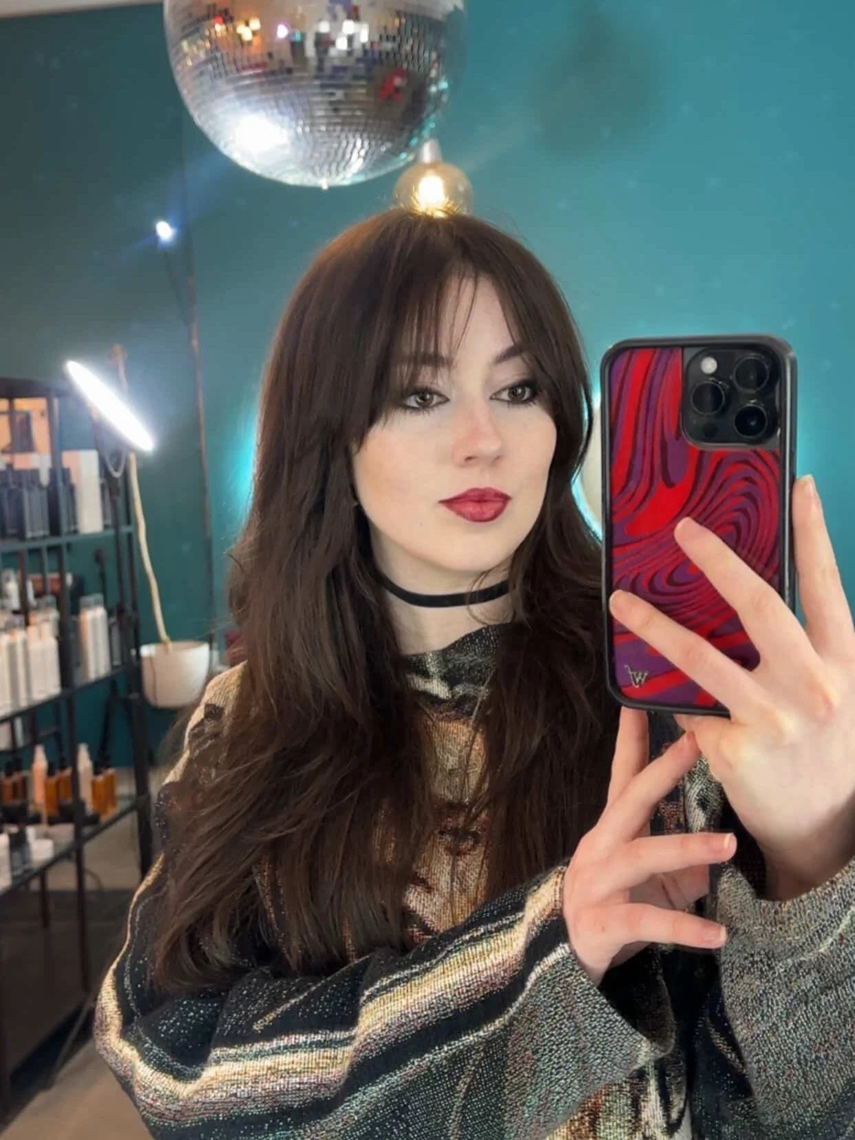 Your Sexy vampire era starts at the chair 🖤🪞

dark, dramatic, and a little dangerous &mdash; this look by @siobhanbenson_  on @alliejordann giving everything 🧛&zwj;♀️✨
wispy bangs &bull; long layers &bull; rich brunette gloss &bull; full glam
book