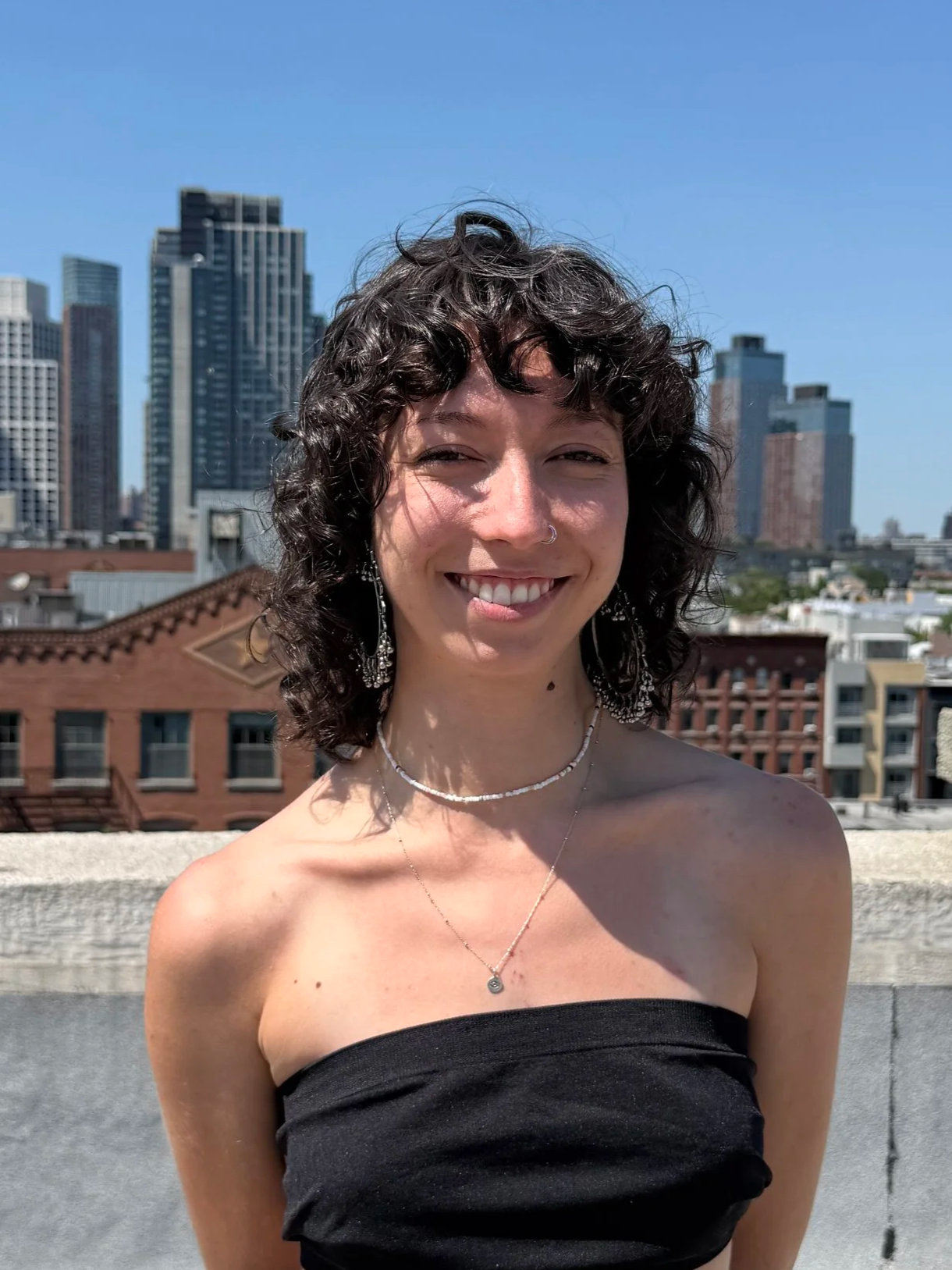 Curly cut, curly lived-in shag, haircut & style at CutLoose salon. Greenpoint, Brooklyn.