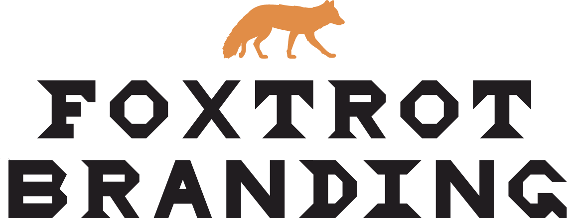 Foxtrot Branding Black Stacked Logo With Orange Fox Icon