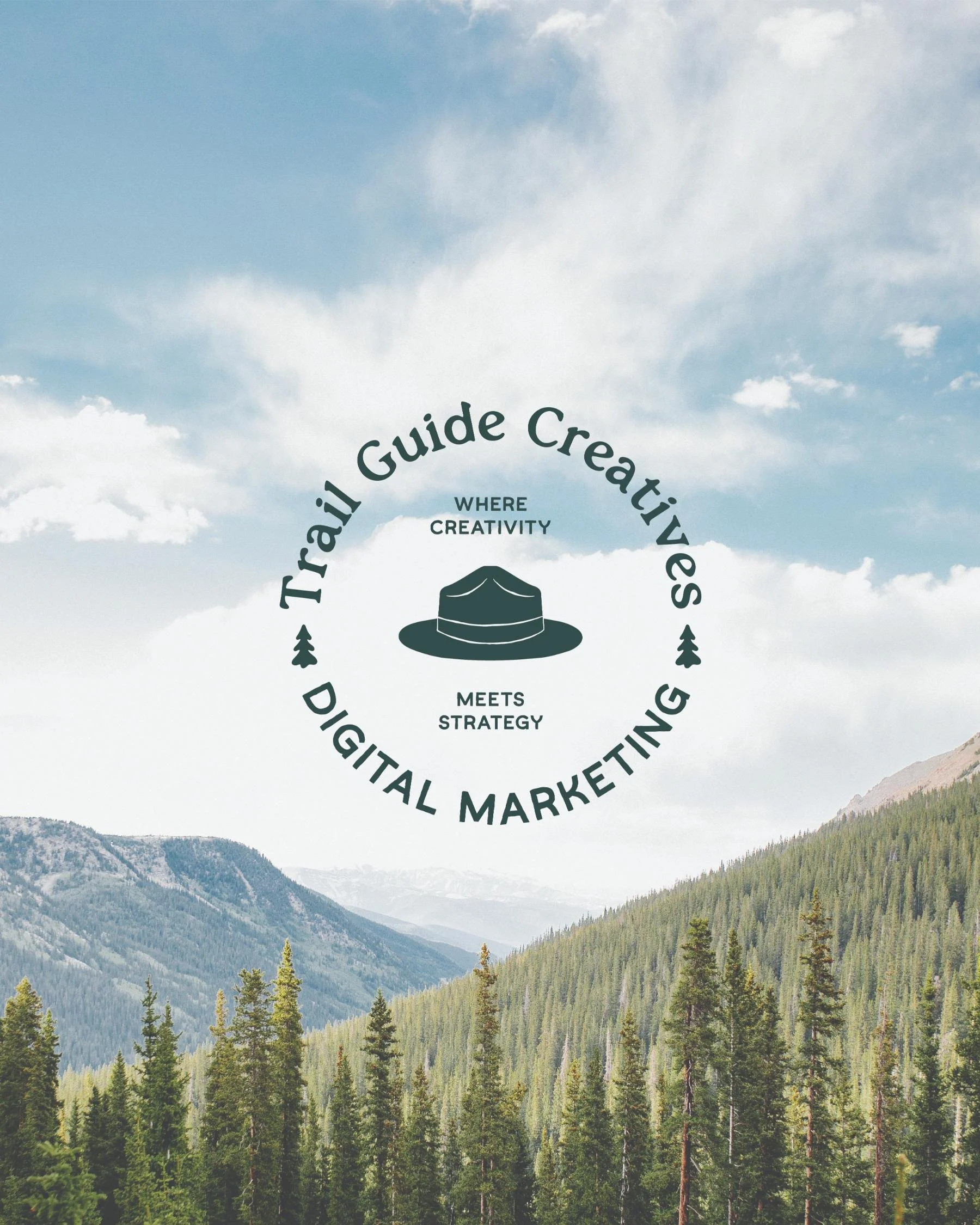 Round badge logo with "trail guide creatives" spelled out and a hat icon in the center