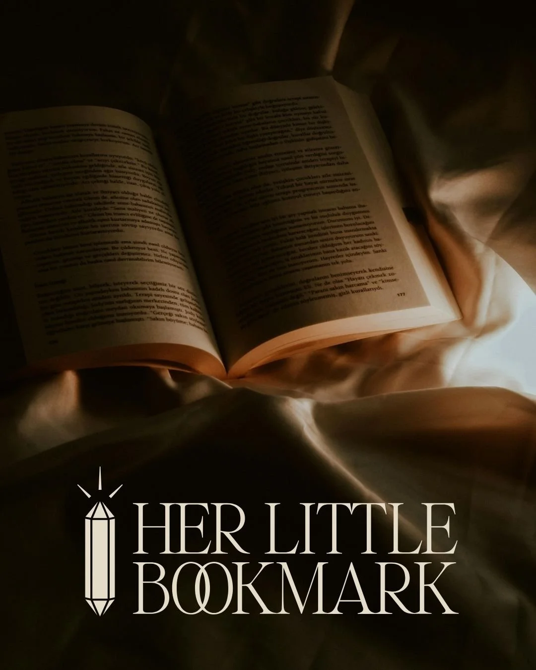 Her Little Bookmark logo over an image of a book on bedsheets