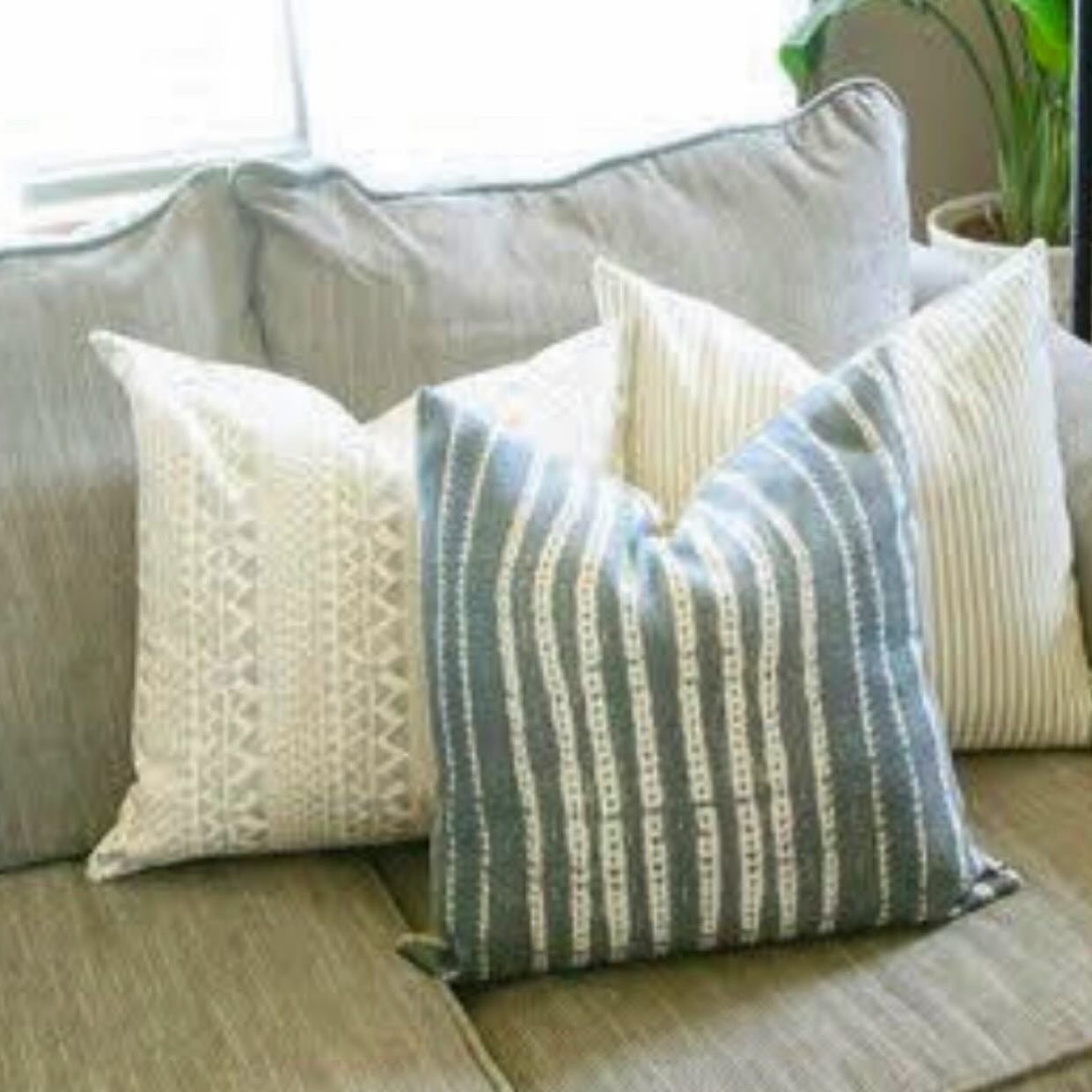 Pillows are one of the easiest ways to freshen up your room. We like to change out our pillows for each season. Think warmer tones for the winter, cooler for the summer, fall tones and of course Christmas. 
Do you keep the same pillows throughout the