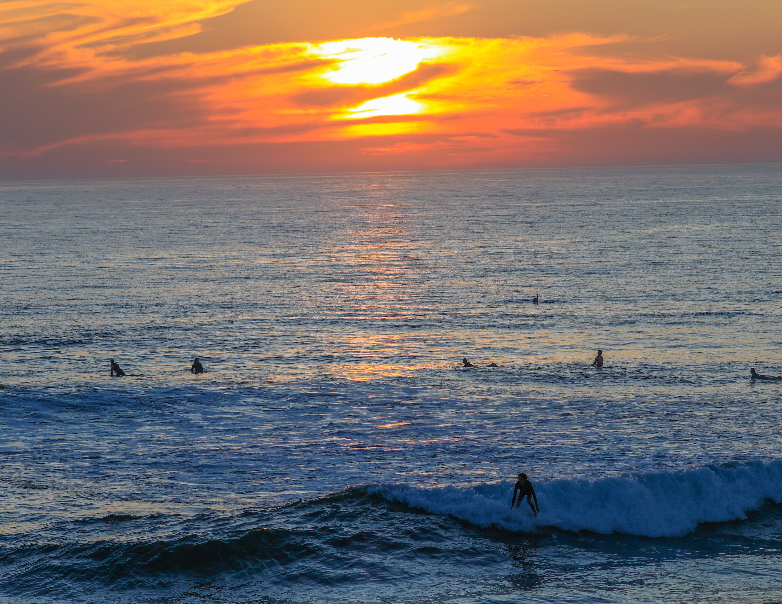 Surfers at Sunset