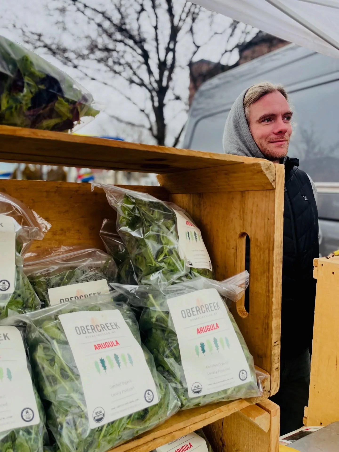 Crates stacked.
Greens packed.
Hoods up.

@obercreekfarm arugula holding it down at the winter market.

Good food doesn&rsquo;t hibernate.
Neither do we.

Sunday 10&ndash;2. 🌿