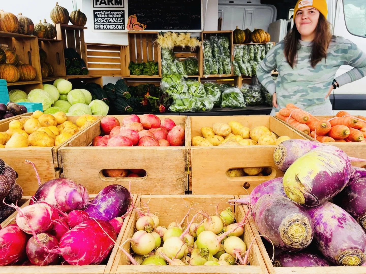 Most of the time when we talk about farmers markets, we talk about the food.

The carrots.
The potatoes.
The winter radishes and cabbages that somehow hold their ground through the cold.

But the real story is the people standing behind the tables.

