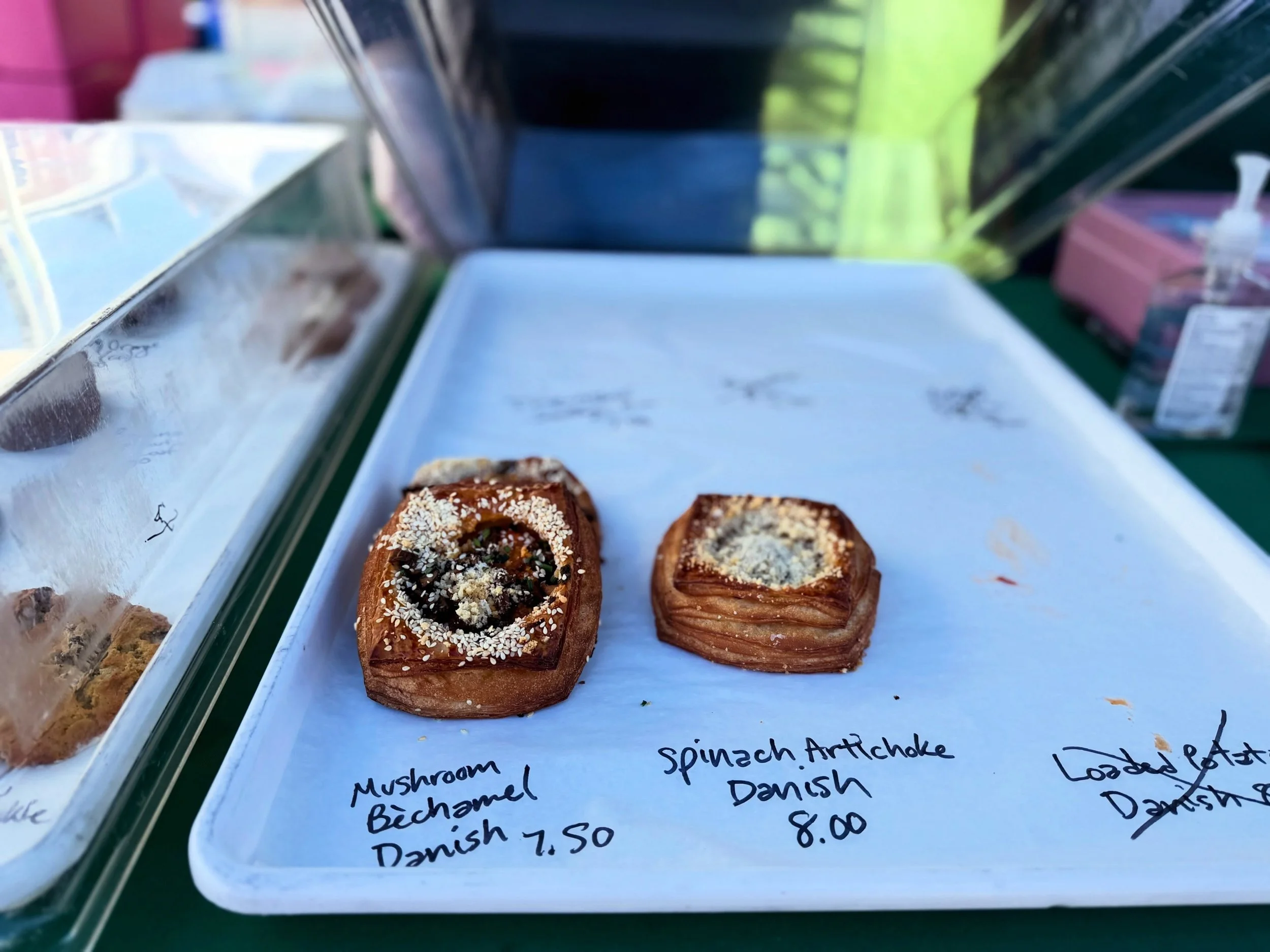 @littleloafbakeshop has a way with savory pastry. Mushroom b&eacute;chamel. Spinach artichoke. All those beautiful, flaky layers.

We love seeing what they dream up. And judging by this tray, so do you. Make them one of your first stops Sunday. Get t