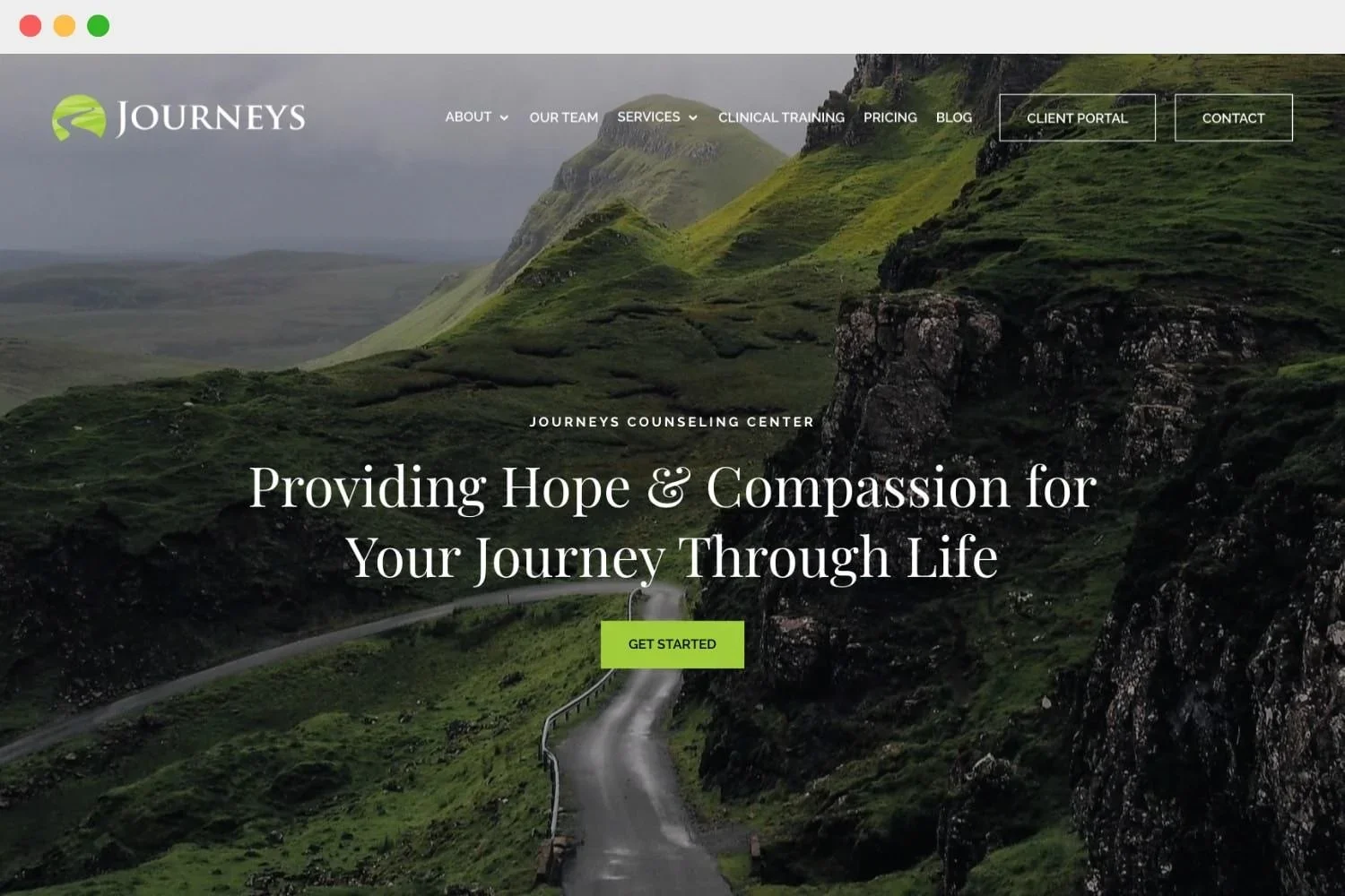 A website homepage for Journeys Counseling Center featuring a scenic landscape of green hills and mountains, with a winding road and a prominent green "Get Started" button.