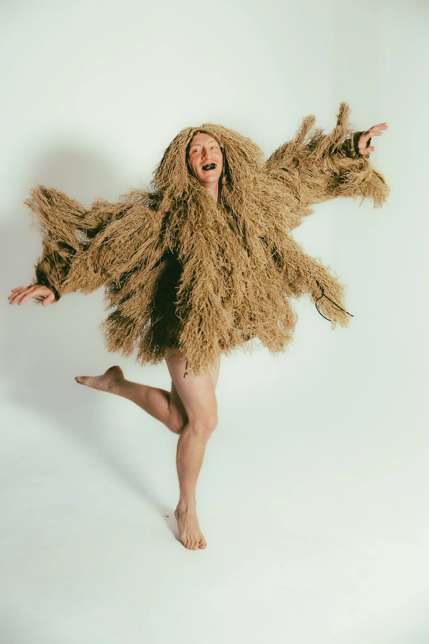 Creator Kyle Carr Scheurich dances wearing elements of the costuming worn in his new work ‘true ribs, rawhide’.