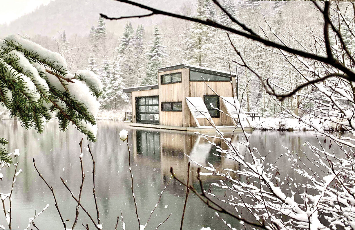 Floating house on the frozen lake