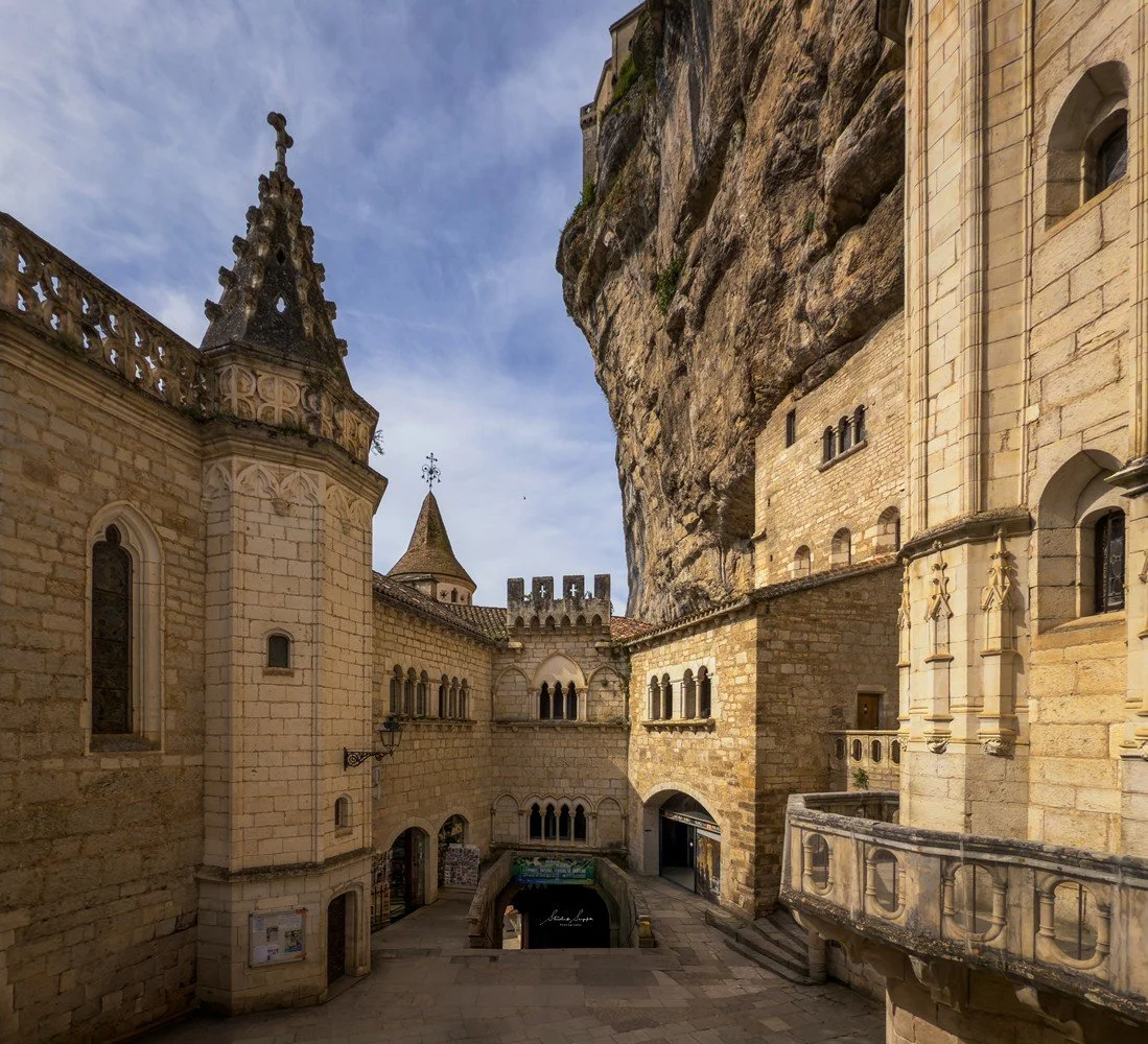 pilgrimage to sanctuary of rocamadour france which is a clifftop medieval village featuring castle chapel of notre dame housing black virgin crypt basilica and tomb of saint amadour