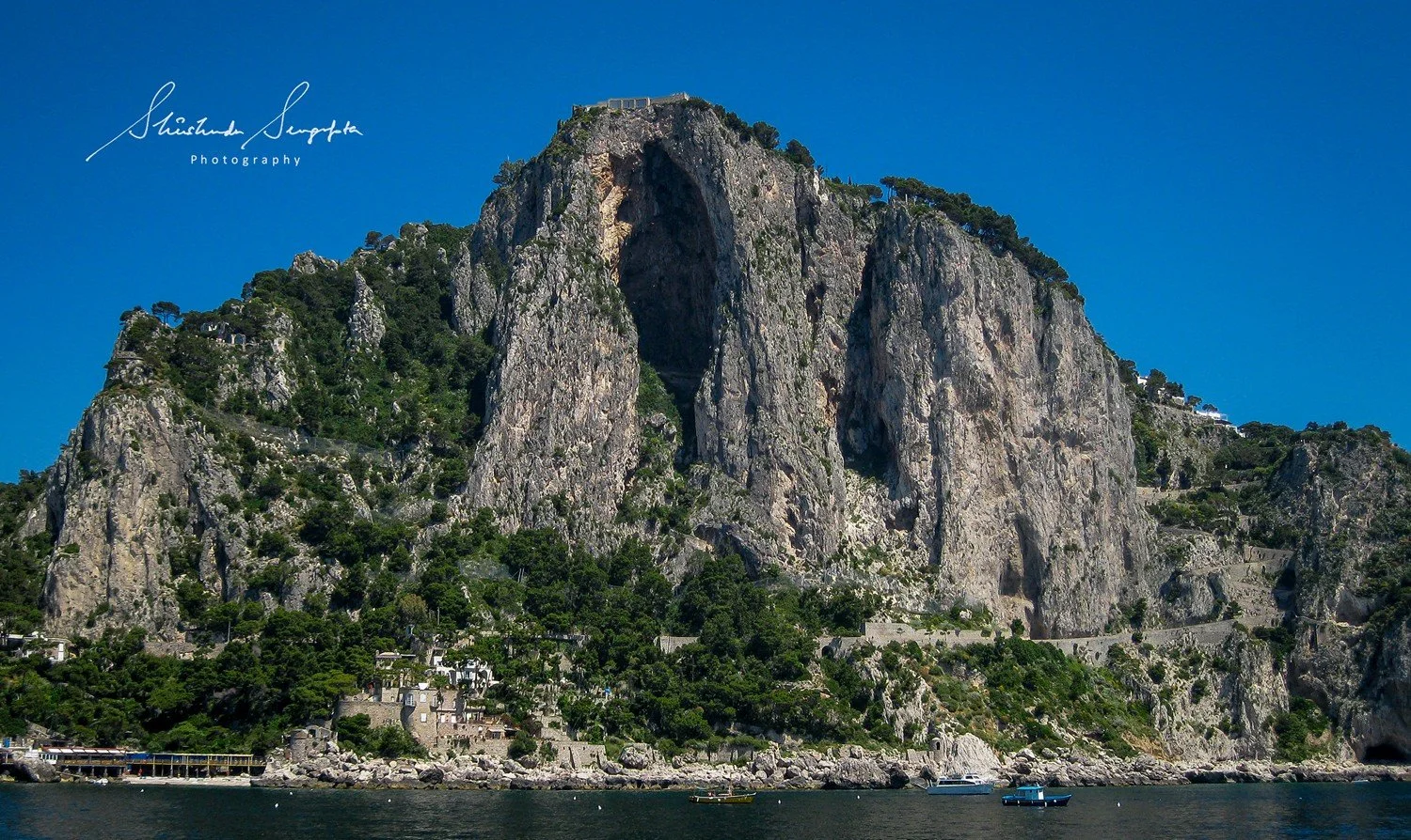 capri island italy featuring limestone rock formation stalagmite stalactite blue grotto cave marina grande and faraglioni