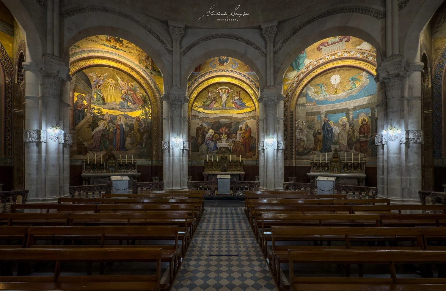 pilgrimage in the city of lourdes france dedicated to Lady Virgin Mary also known as Immaculate Conception who gave apparition to St. Bernadette featuring sanctuary church basilica grotto cave miraculous water and Marian procession